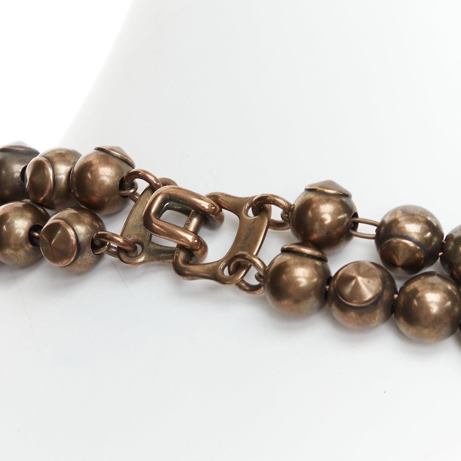 Tomas Maier, collana a doppio filo con sfere rotonde in bronzo con finitura antica
Riferimento: LNKO/A02578
Marchio: Tomas Maier
Materiale: Metallo
Colore: bronzo
Modello: Tinta unita
Chiusura: Gancio e barra

CONDIZIONE:
Condizioni: Molto bene,