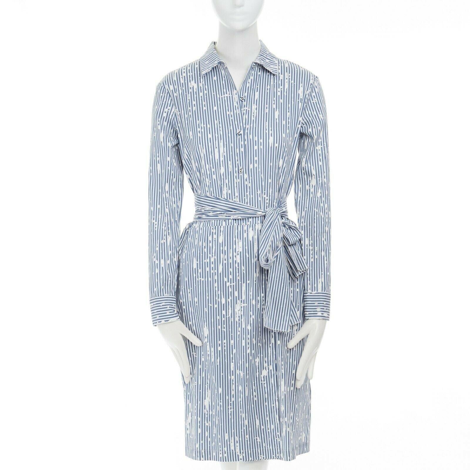 TOMAS MAIER cotton blend blue white splatter print belted casual dress US0 XS 
Reference: LNKO/A01048 
Brand: Tomas Maier 
Material: Cotton 
Color: Blue 
Pattern: Striped 
Closure: Button 
Extra Detail: Cotton blend. Blue and white vertical stripe