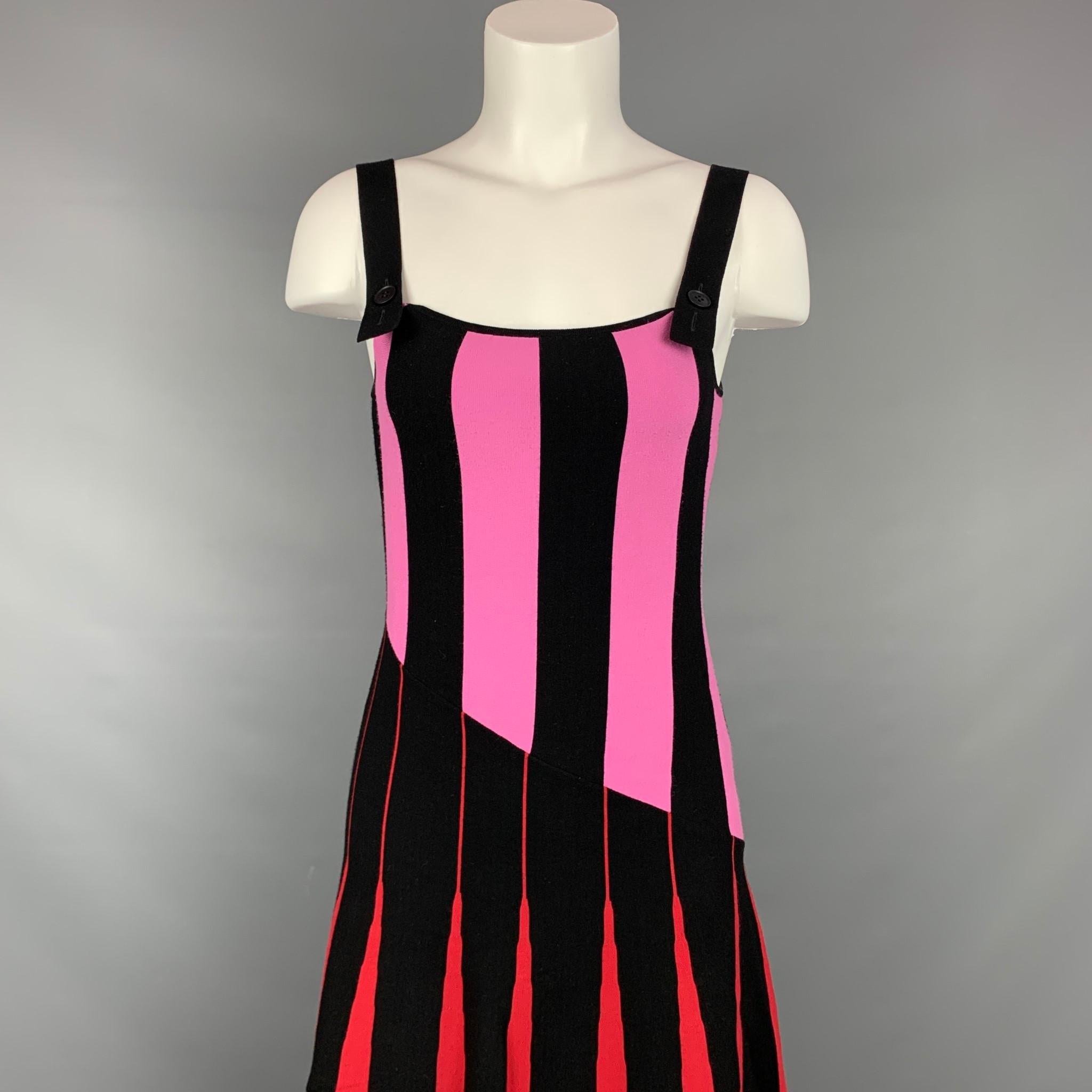 TOMAS MAIER dress comes in a black & red stripe viscose / polyester featuring buttoned straps and a-line style. Made in Italy.

Very Good Pre-Owned Condition.
Marked: 2

Measurements:

Bust: 30 in.
Waist: 28 in.
Hip: 36 in.
Length: 36 in. 