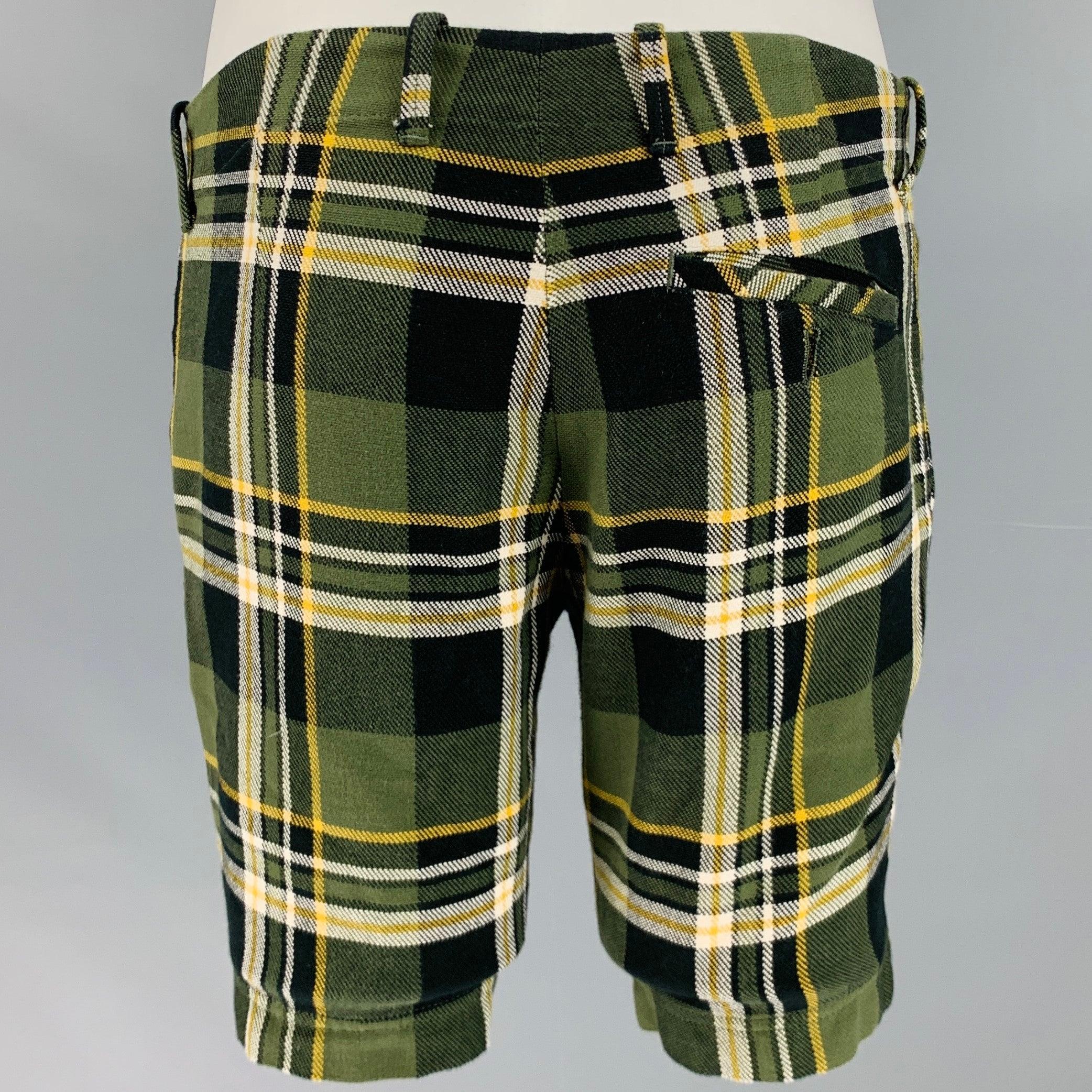 TOMAS MAIER shorts
in a green and yellow cotton woven fabric featuring a plaid pattern, three pockets, and button fly closure. Made in Italy.Very Good Pre-Owned Condition. Minor signs of wear, missing back pocket button. 

Marked:   31