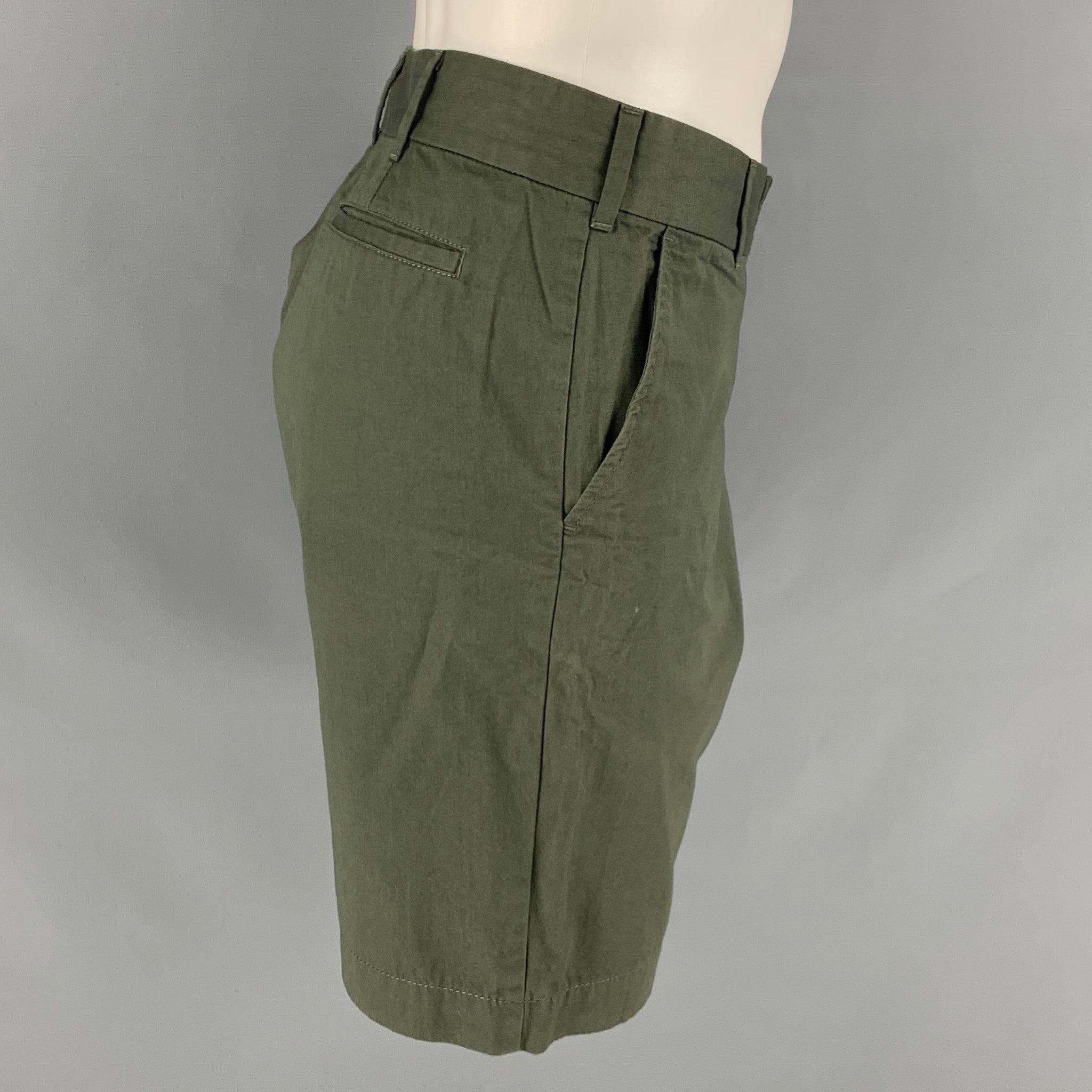 TOMAS MAIER shorts comes in an olive cotton twill woven material featuring a flat front, and zip fly closure. Made in Italy.Excellent Pre-Owned Condition. 

Marked:   34 

Measurements: 
  Waist: 35 inches Rise: 9 inInseam: 8.5 inches Leg Opening: