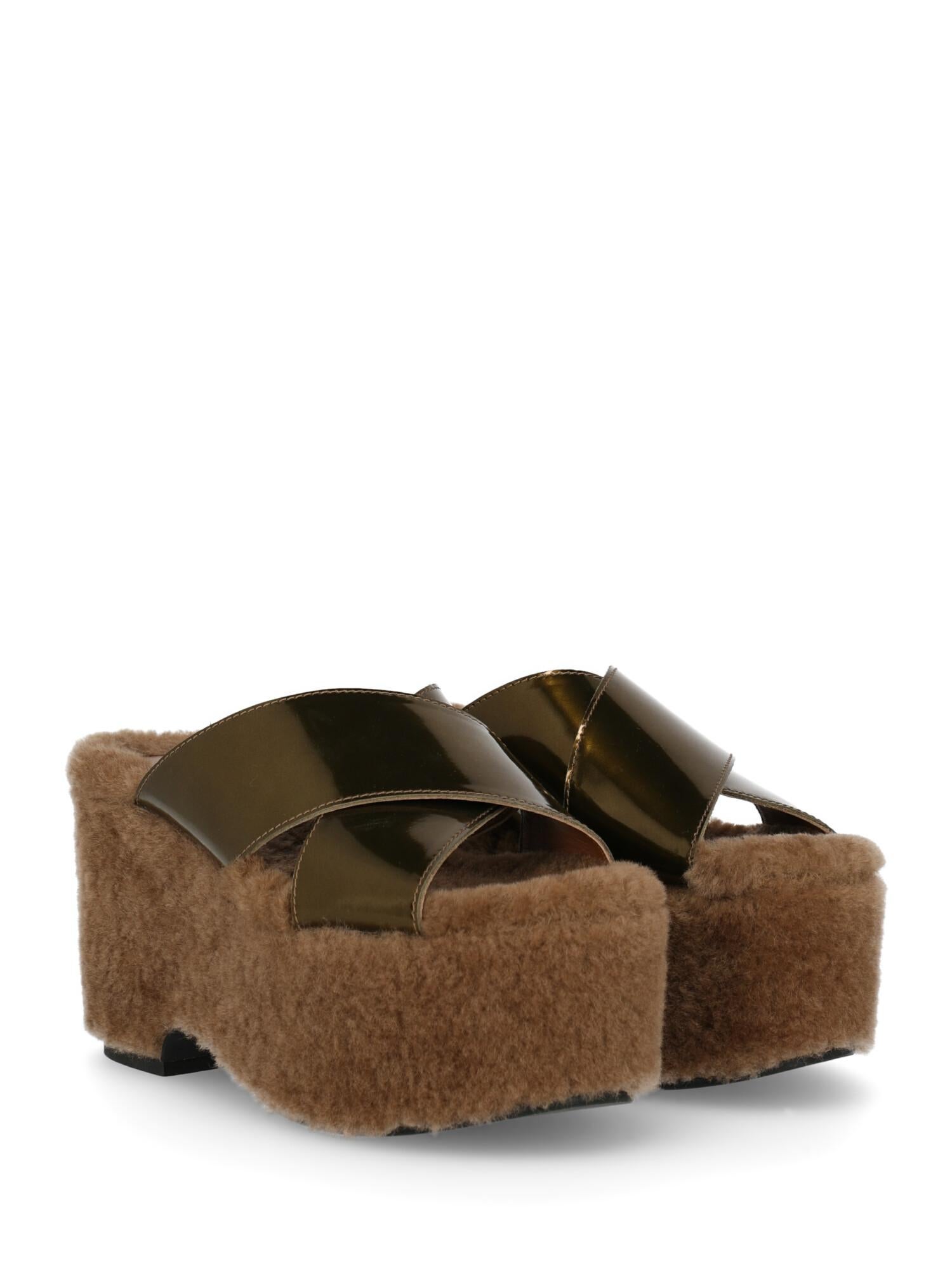 Wedges, faux fur, solid color, backless design, lining with logo, open toe, branded insole, wedge heel, low and flat heel, fur lining. Product Condition: Very Good. Sole: negligible signs of use. Insole: negligible footprint

