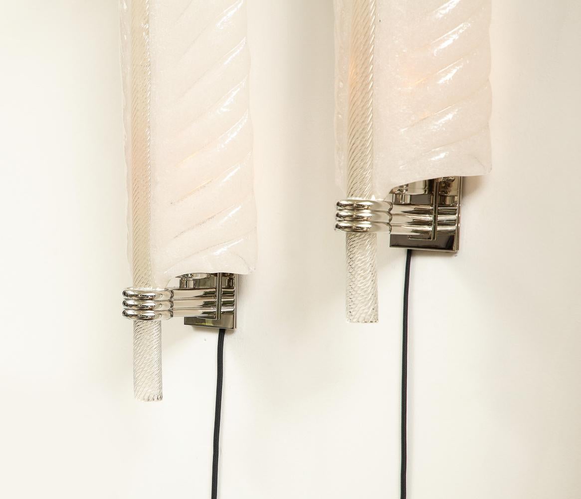 Pair of No. 413 Wall Lights by Tomaso Buzzi for Venini.  Hand blown glass, brass, chromed metal. Pulegoso glass leaf forms with 1 x E26 socket per light. *An example of these sconces were first exhibited at the 5th Milan Triennale in 1933.