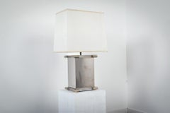 Lámpara de mesa Tomasso Barbi de acero pulido y lucita