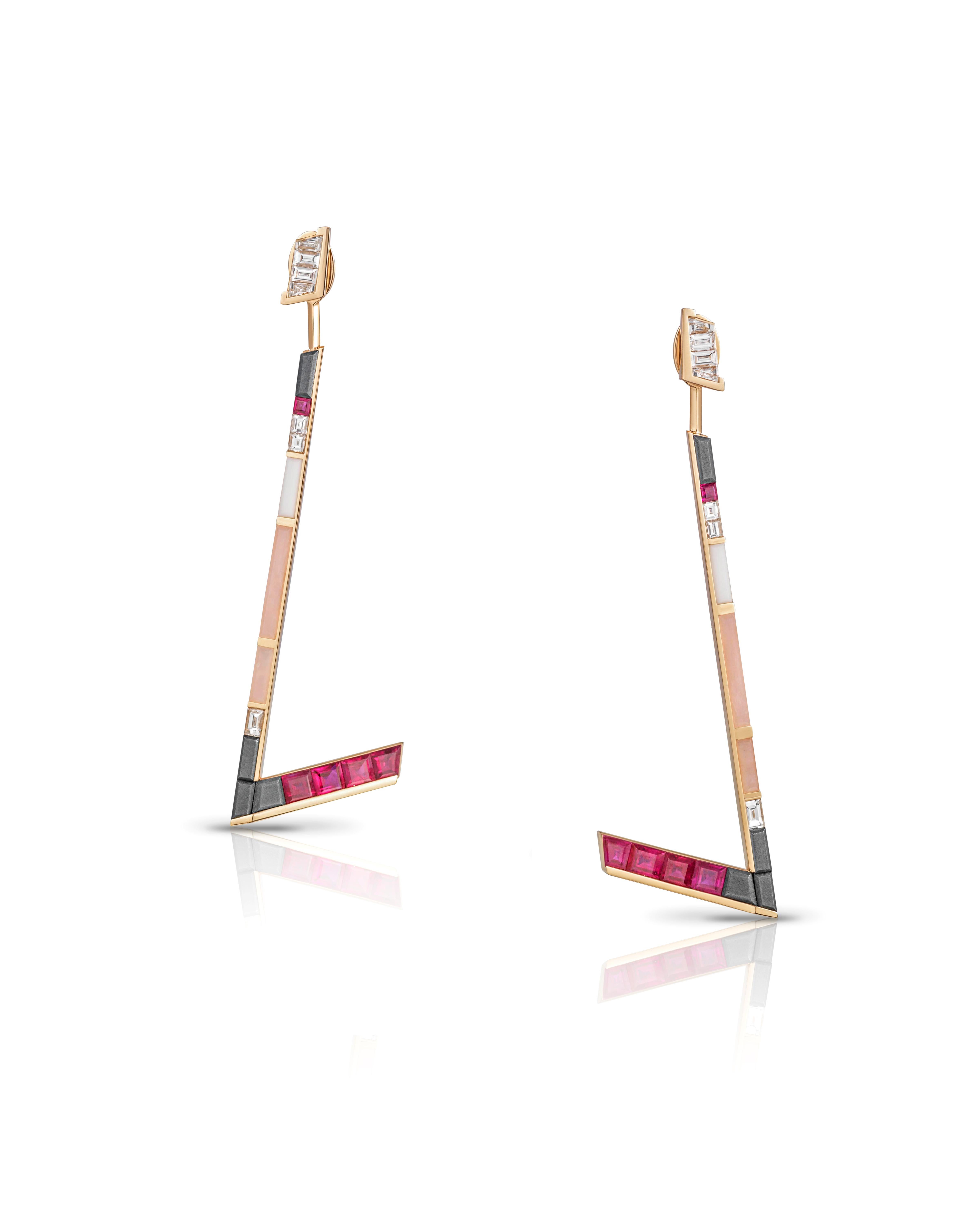 Earrings in 18 Karat Rose Gold set with White Diamonds (o.76 carat), White Agate, Mozambique Rubies, Pink Opal and Hematite Baguettes.

The Stellar Zigzag Earrings have detachable tassels for more versatility. This way the diamond studs can be worn