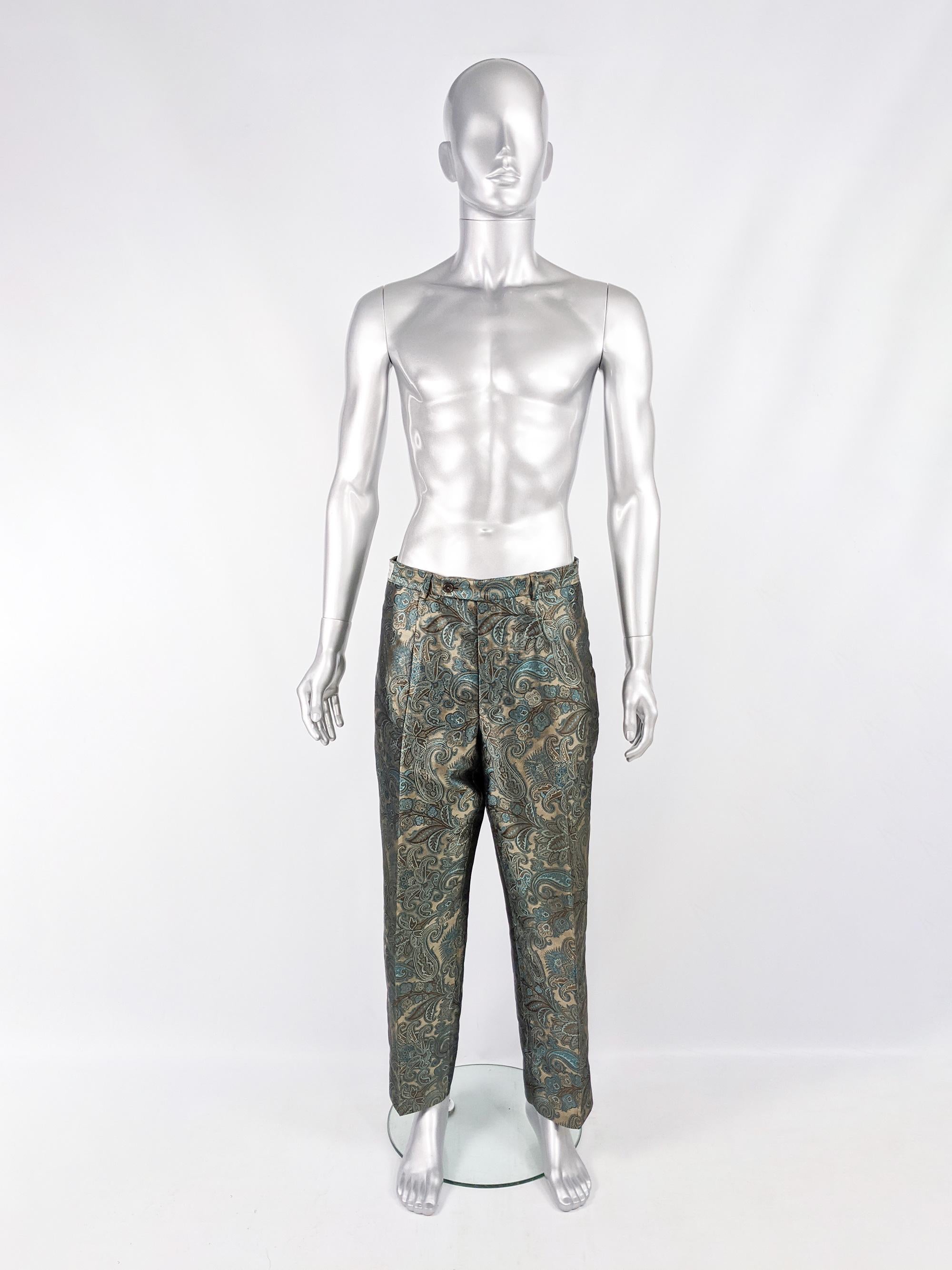 An excellent pair of vintage mens trousers from the 90s by luxury British fashion designer, Tomasz Starzewski who was famous for dressing royals (like Princess Diana) and actors alike. Made in Italy, in a bold green and muted gold pure silk jacquard