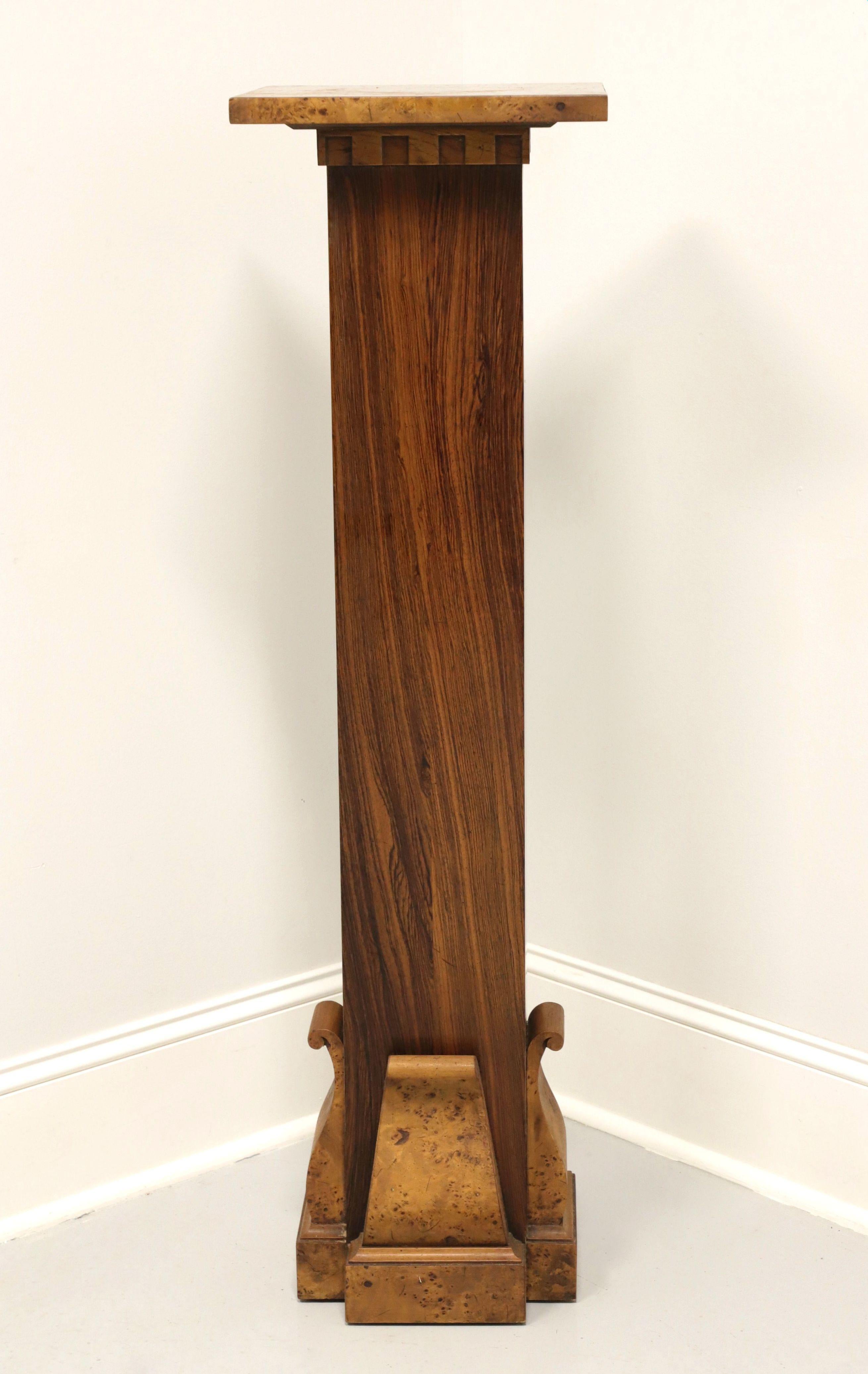 A vintage Neoclassical style tall display column / plant stand by Tomlinson Furniture. Walnut and burl walnut; square column of walnut with flat cap top and decorative scroll-like base of burl walnut. Made in North Carolina, USA, circa early