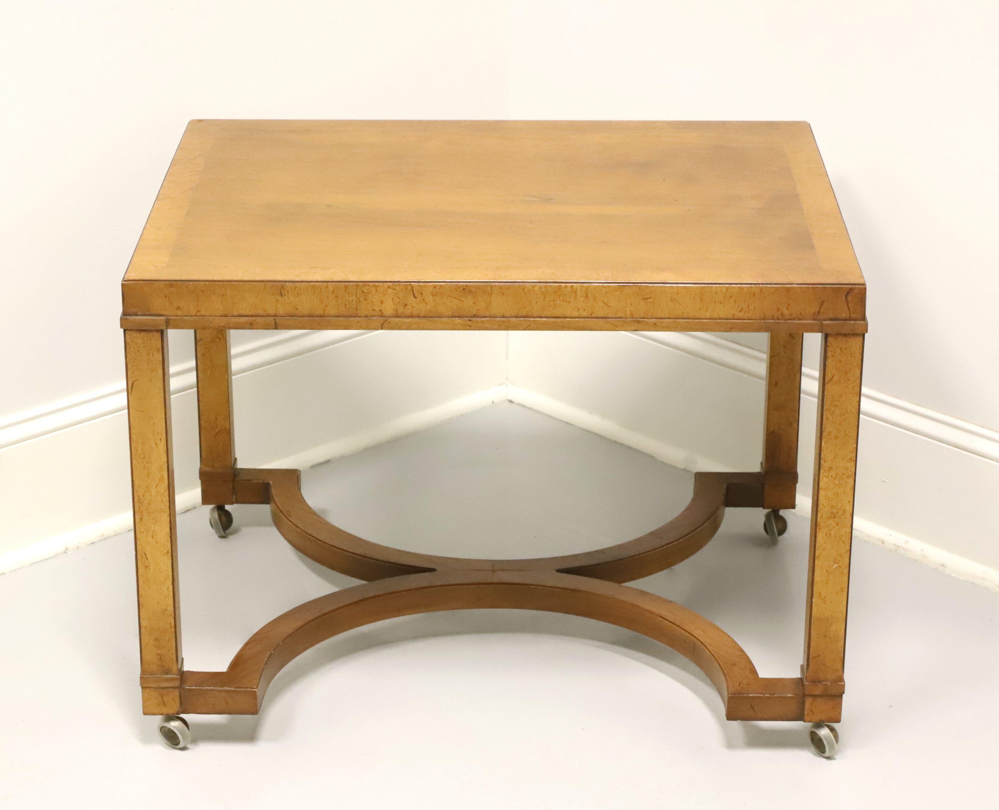 A Neoclassical style rectangular side table by Tomlinson Furniture. Walnut with burlwood banding to top, slightly distressed finish, straight square legs affixed to 