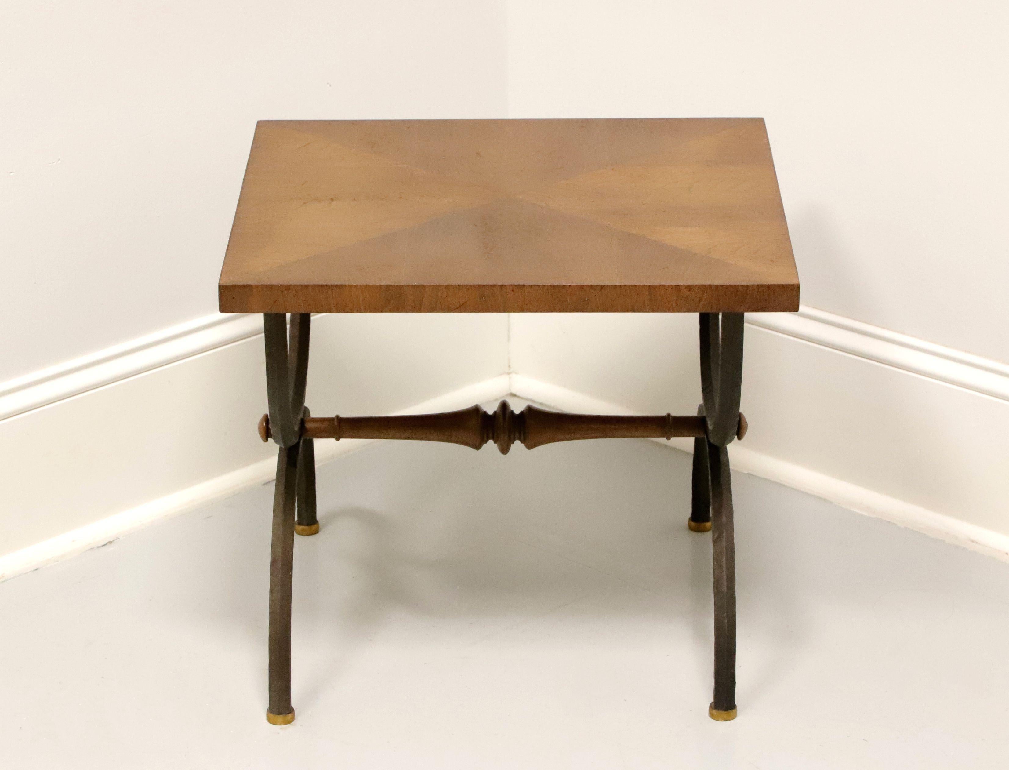 A mid 20th Century cocktail table by Tomlinson Furniture. Walnut with their Chateau finish, parquetry design top, prong 