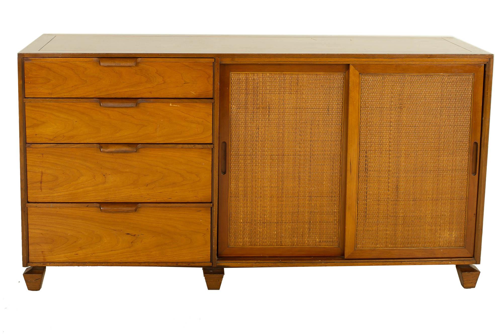 Tomlinson mid century walnut cane front sideboard credenza

This credenza measures 61 wide x 20 deep x 32 inches high

?All pieces of furniture can be had in what we call restored vintage condition. That means the piece is restored upon purchase