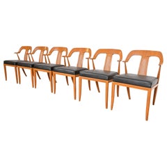 Tomlinson Sofisticados sillones de comedor modernos de mediados de siglo de nogal y caña