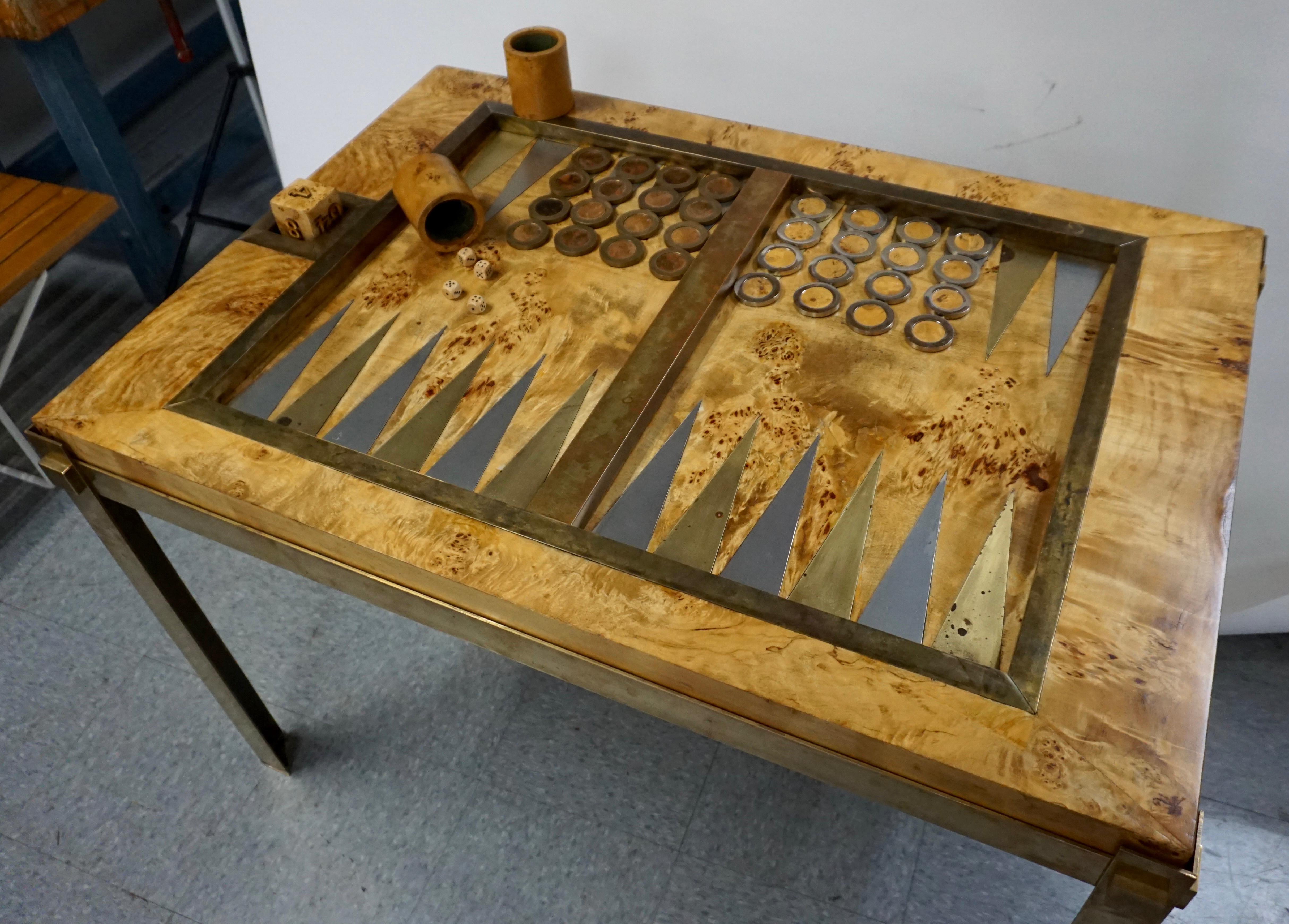 Made in Italy. All of the pieces are included with this restored game table; 16 each of the brass and chrome pieces, two dice tumblers, four dice and one doubler dice. Brass has a great patina. Some minor chips in veneer.