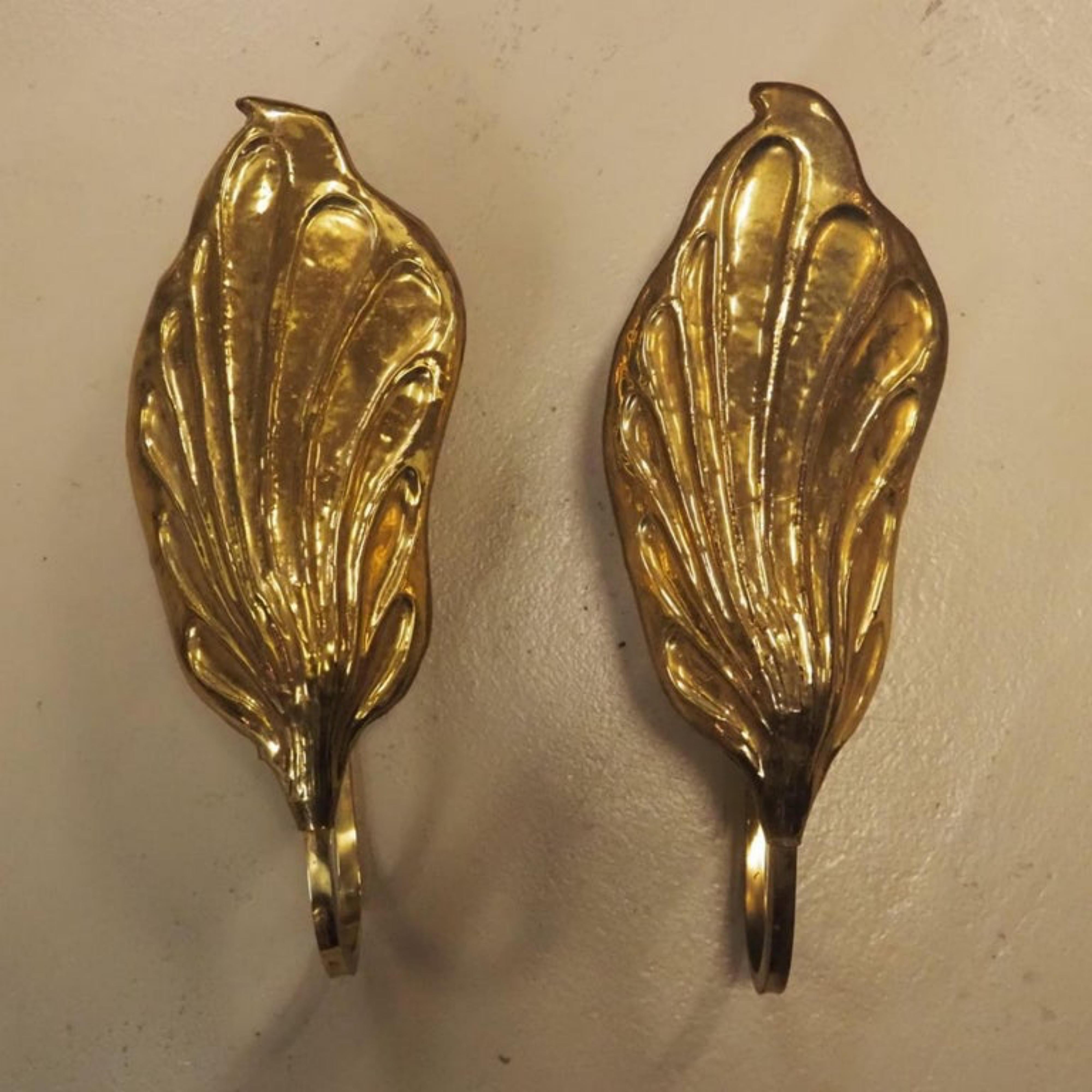 Tommaso Barbi / Carlo Giorgi
Set of two lovely Mid-Century Modern brass 'Leaf' wall lamps or sconces. Designed by Carlo Giorgi for Bottega Gadda, 1970s, Italy. 
Pair of Sconces circa 1970, model 
