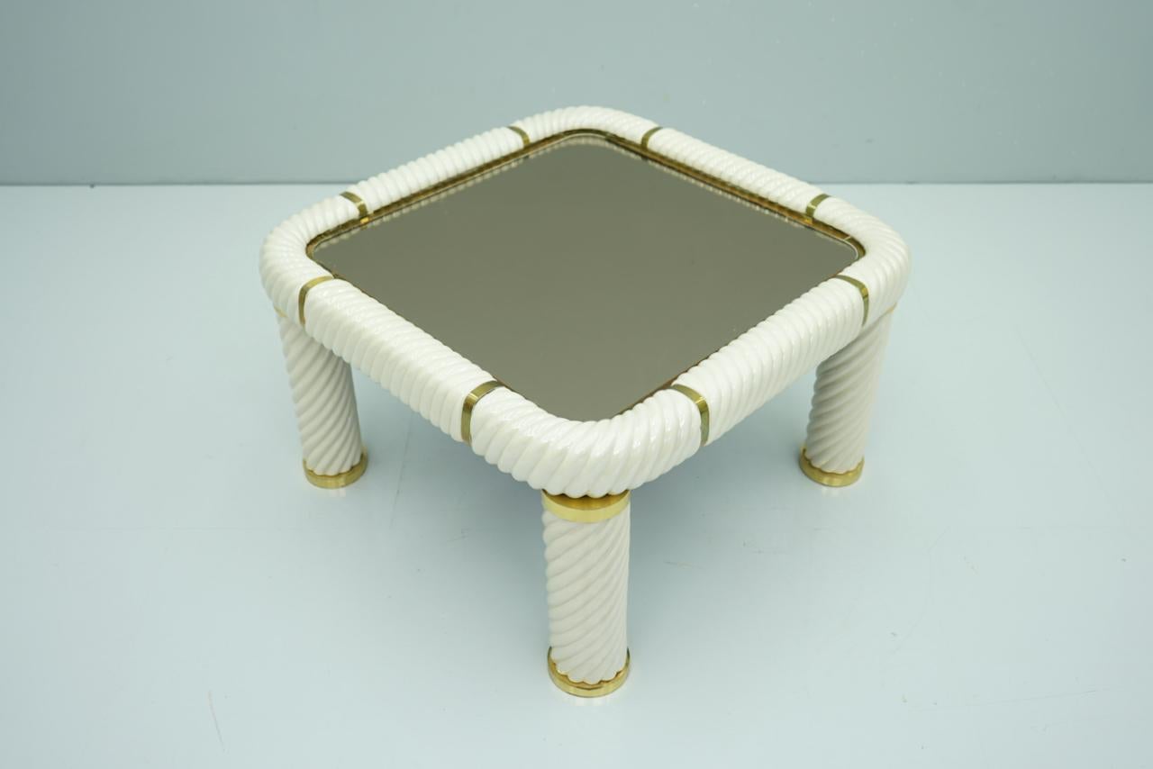 Italian coffee table from ceramic, brass in mirror glass, by Tommaso Barbi, Italy, 1970s.
Measures: W 79 cm, D 79 cm, H 48 cm.
Good to very good condition.