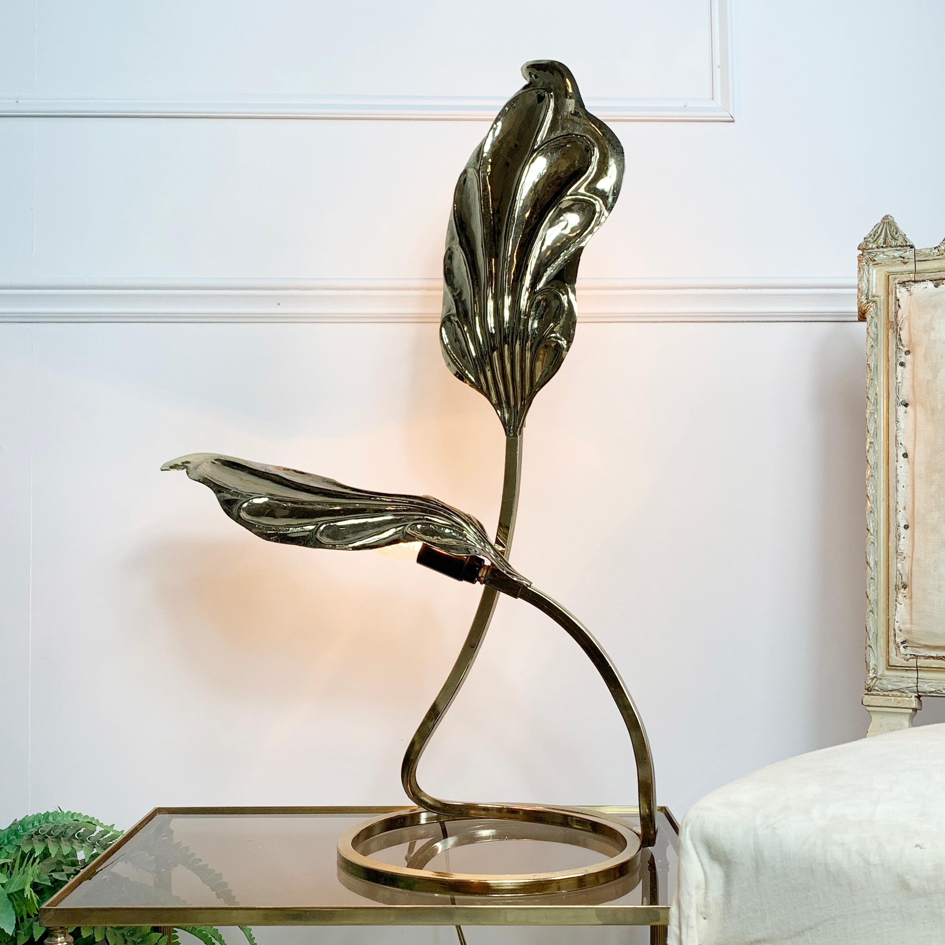 A beautiful Tommaso Barbi & Carlo Giorgi double leaf lamp, created for Bottega Gada Italy in the 1970’s. This piece is handmade and in a polished brass finish, the two lamp holders sit beneath the highly detailed decorative leaves.
This is a