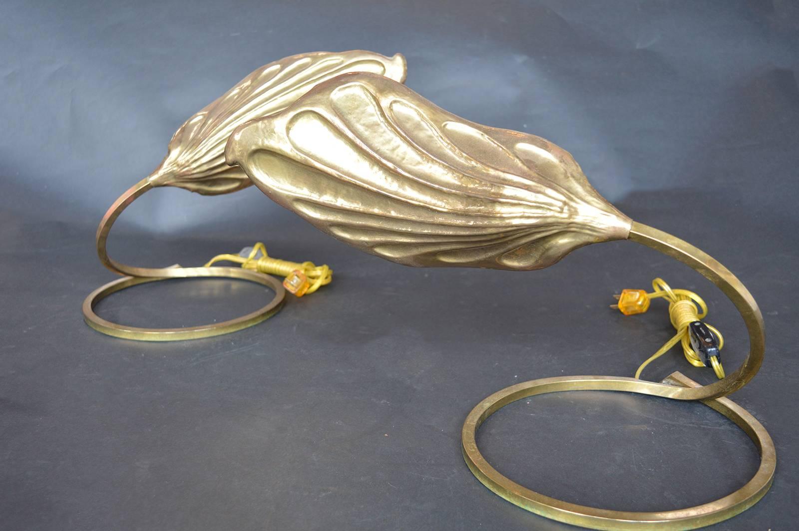 Pair of Tommaso Barbi leaf lamps in brass.