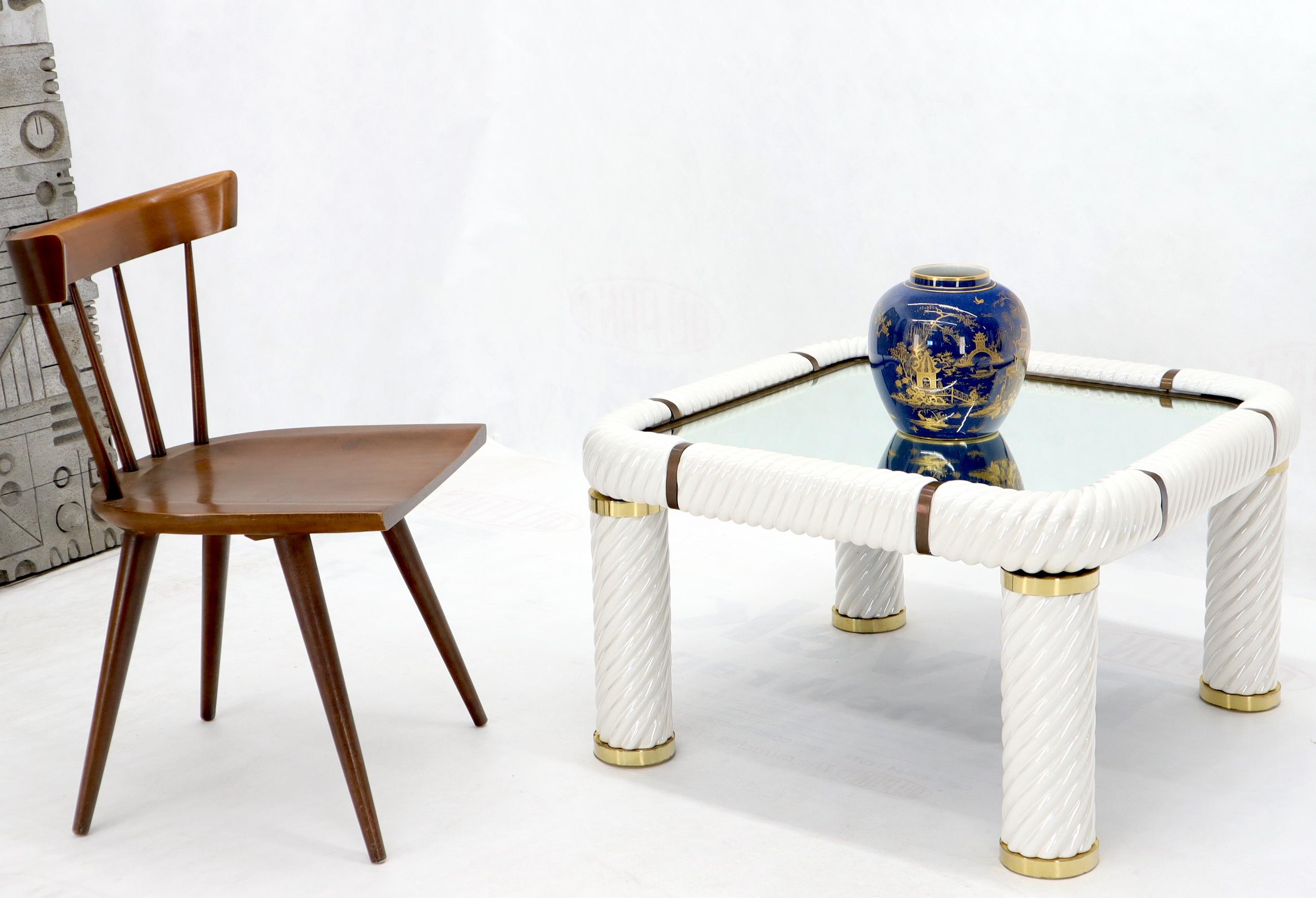 Porcelain and brass glass mirrored top side coffee table made in Italy designed by Tommaso Barbi. 