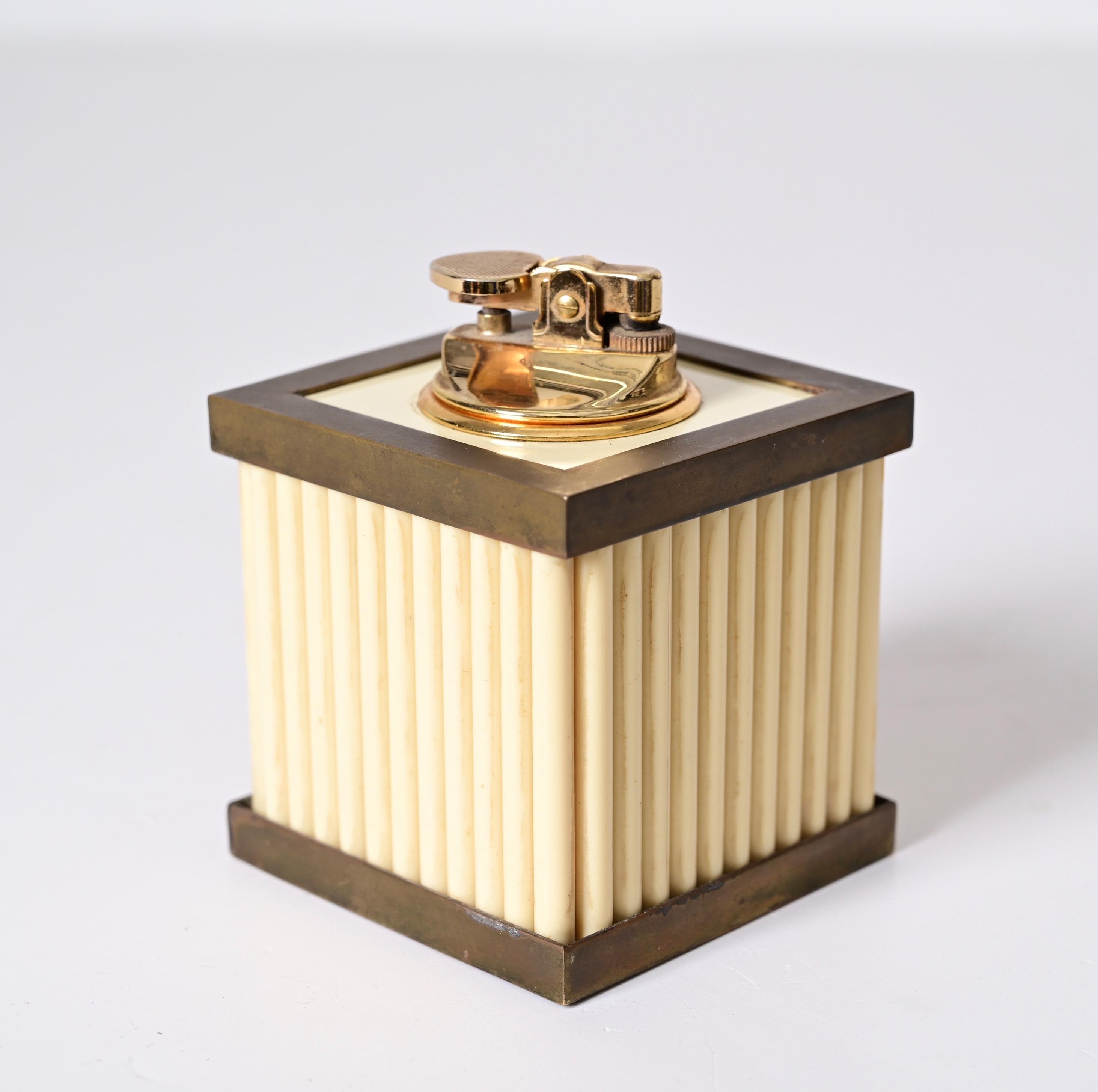 Late 20th Century Tommaso Barbi Midcentury Lucite and Brass White Cream Italian Table Lighter 1970