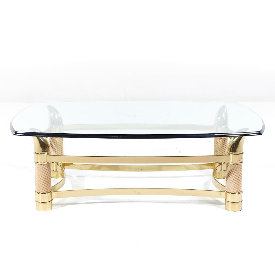 Tommaso Barbi Postmodern Italian Brass Faux Tusk Coffee Table

This coffee table measures: 51.25 wide x 37.5 deep x 16.5 inches high

All pieces of furniture can be had in what we call restored vintage condition. That means the piece is restored