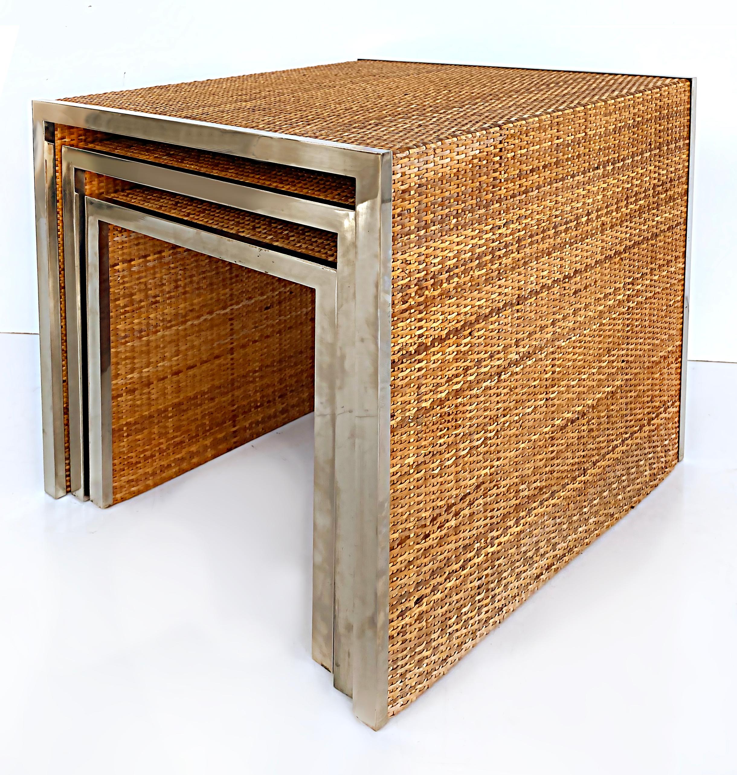 Tommaso Barbi Reed, stainless steel nesting tables, Italy 1970s, Set of 3

Offered for sale is a set of 3 Tommaso Barbi nesting tables that are clad in woven reed and trimmed in stainless steel. The set can be used stacked together or individually