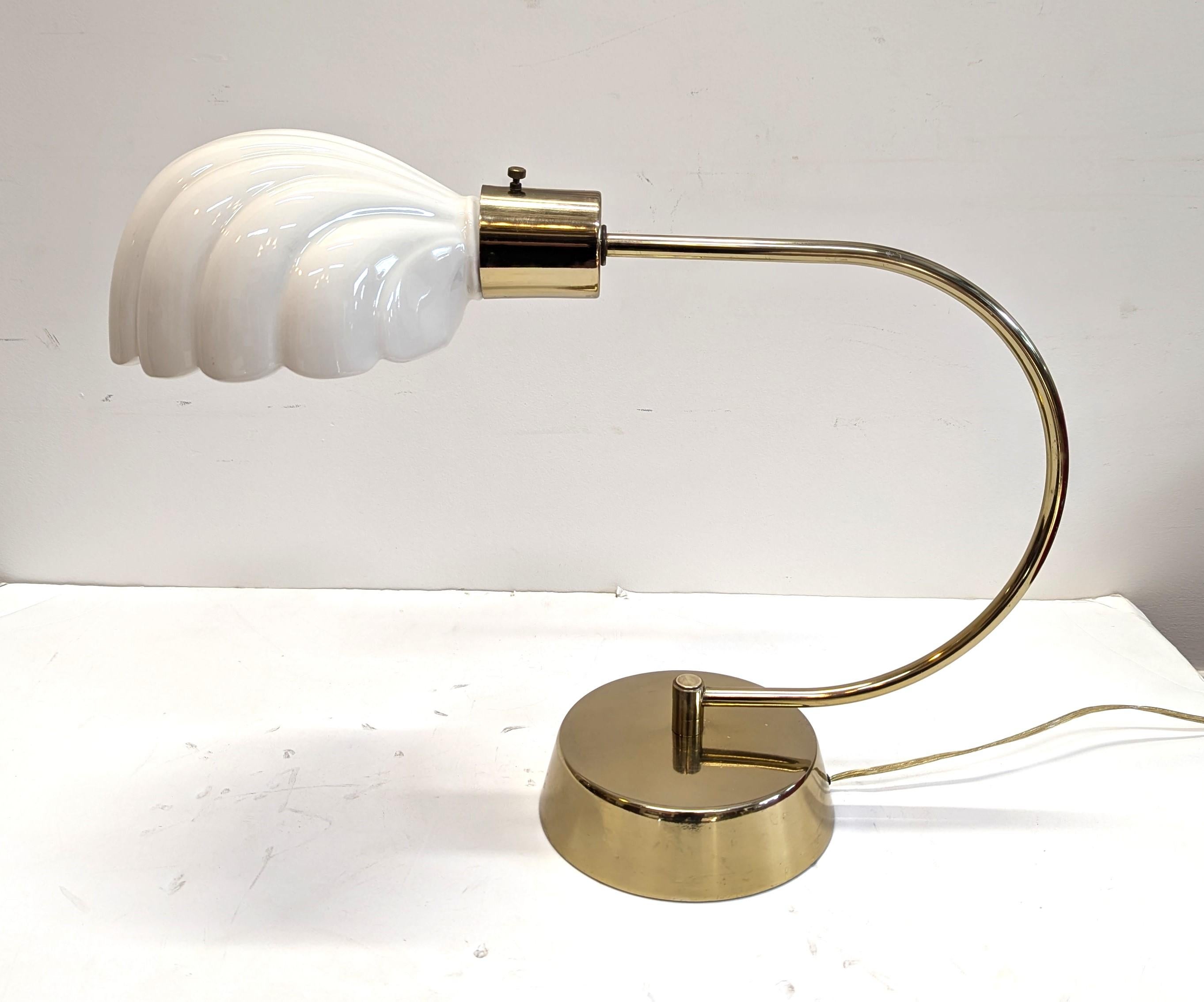 Tommaso Barbi Ceramic Scallop Shell and Brass Table Lamp .   This beautiful Table lamps diffuser - shade can rotate to the left or right 180, allowing you to turn the shade up or to the side.  This model was produced in a table lamp and a floor
