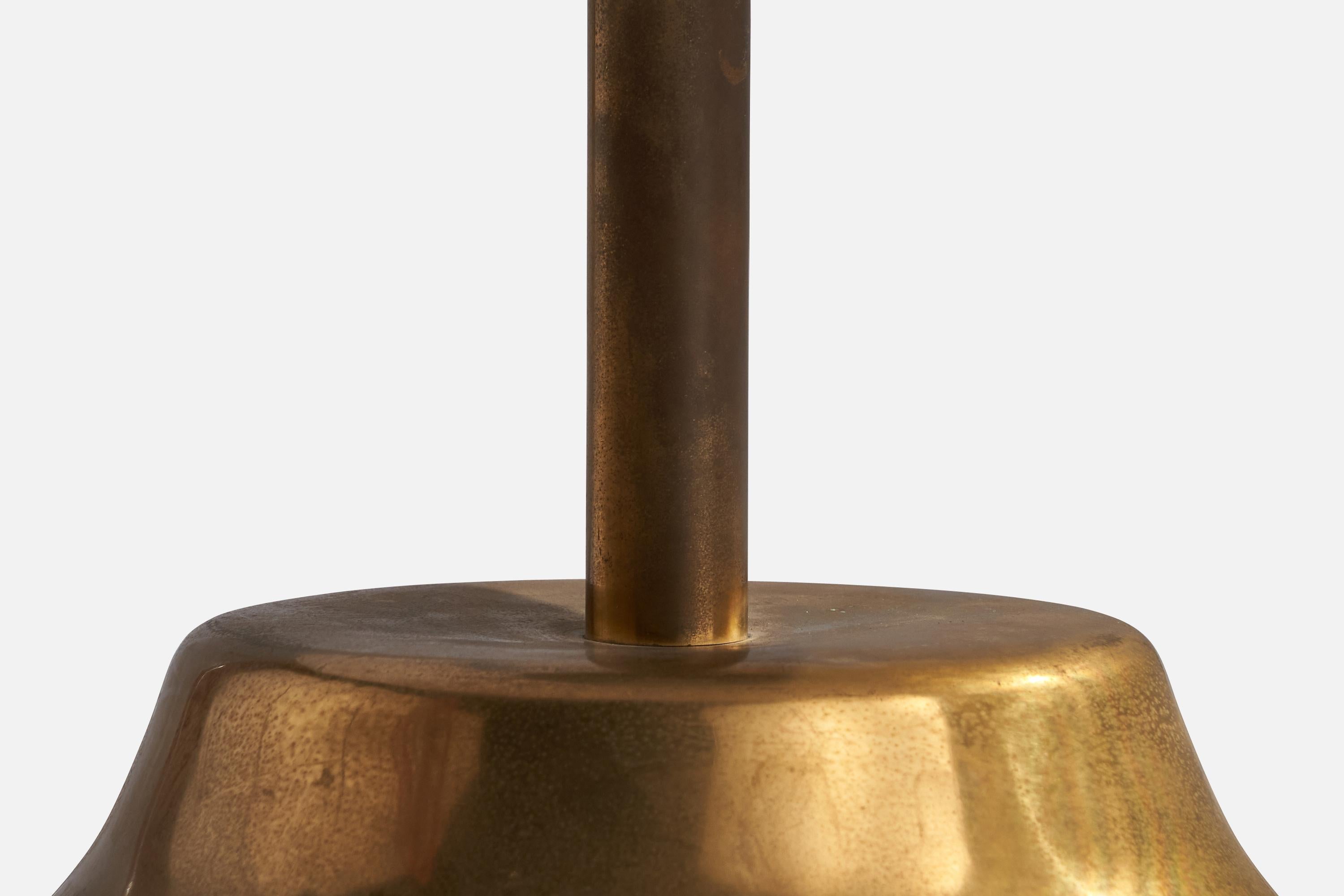 A brass table lamp designed by Tommasso Barbi and produced by G&G Disegno, Italy, c. 1970s.

Dimensions of Lamp (inches): 23” H x 11.5” Diameter
Dimensions of Shade (inches): 10