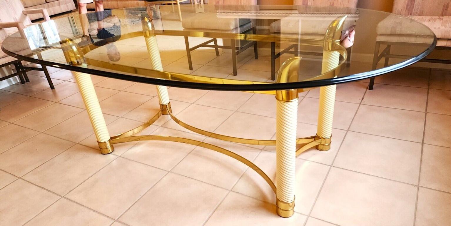 For FULL item description click on CONTINUE READING at the bottom of this page.

Offering One Of Our Recent Palm Beach Estate Fine Furniture Acquisitions Of A
TOMMASO BARBI Brass Tusk Dining Table
With brass tusks.

We also have the matching