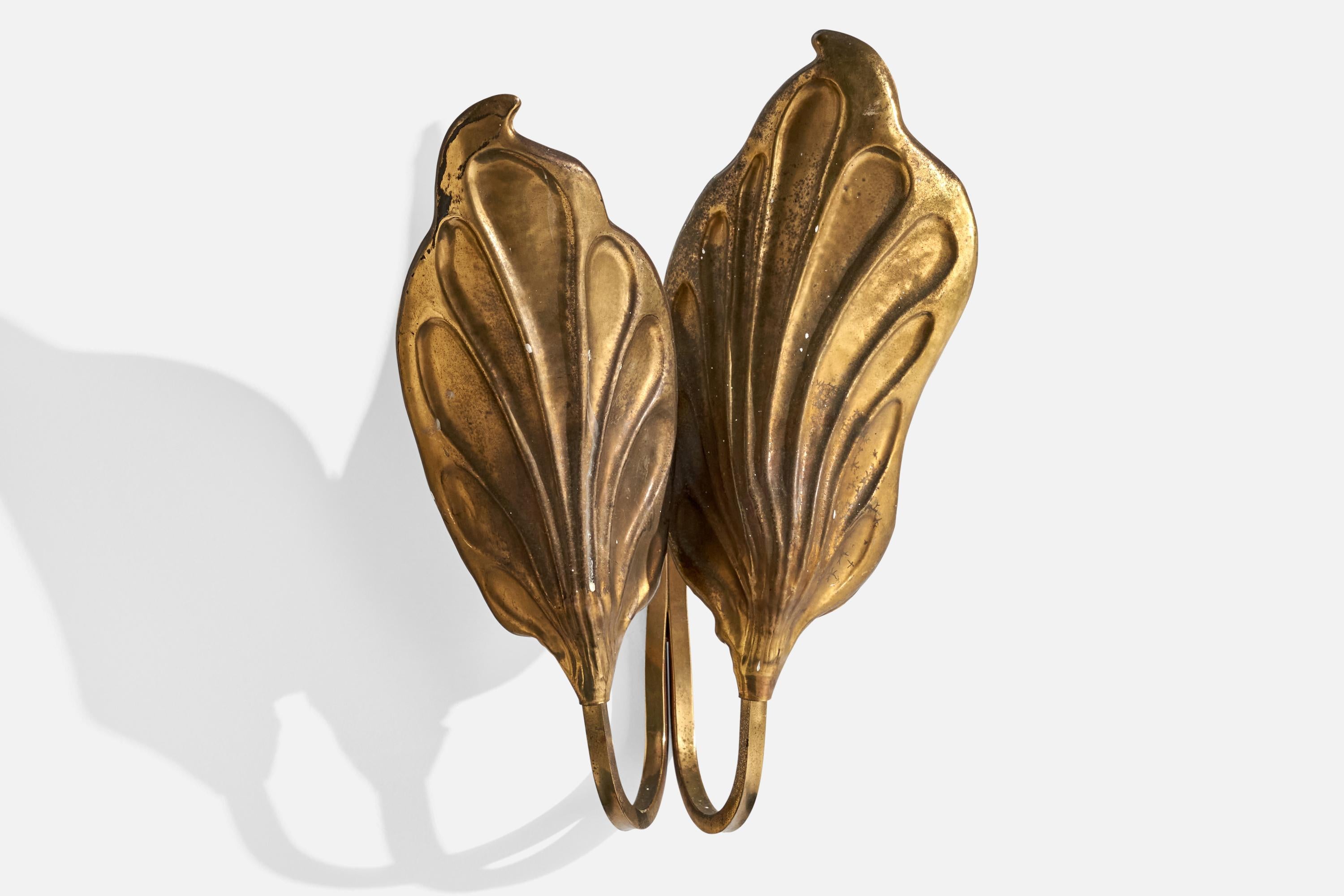 A brass wall light designed by Tomasso Barbi and produced by G&G, Italy, 1950s.

Overall Dimensions (inches):  15.75” H x  11.5” W x  6.5“D
Back Plate Dimensions (Inches):  3.75” H x 3.75” W x 1” D
Bulb Specifications: E-14 Bulbs
Number of Sockets