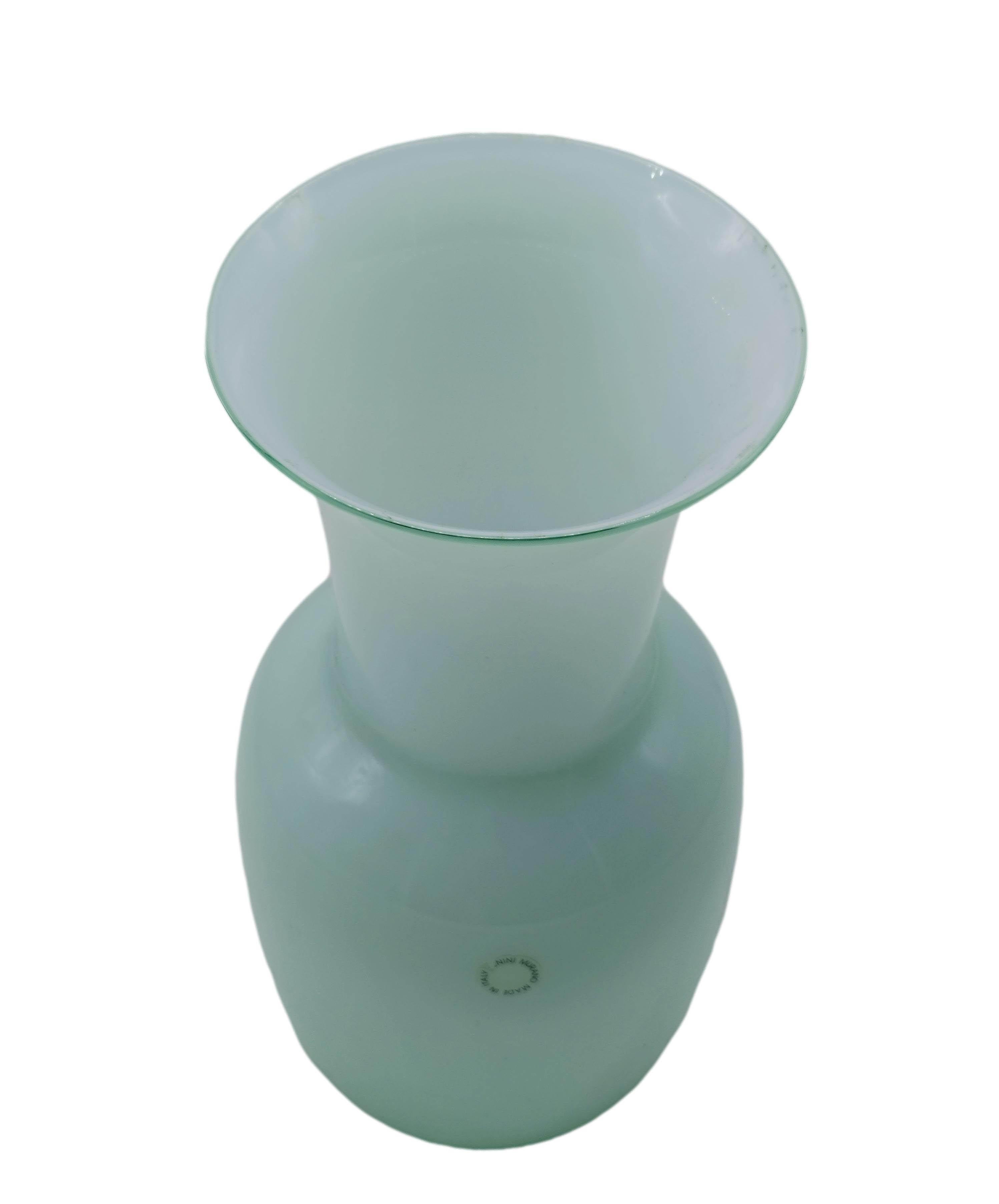 Murano glass vase series ‘Opalino’ by Tommaso Buzzi for Venini, with engraved signature 1994. Nile green colour and white interior. The Opalino vase is made of hand-blown and hand-worked opaline glass. A unique and unrepeatable work, with a pure and