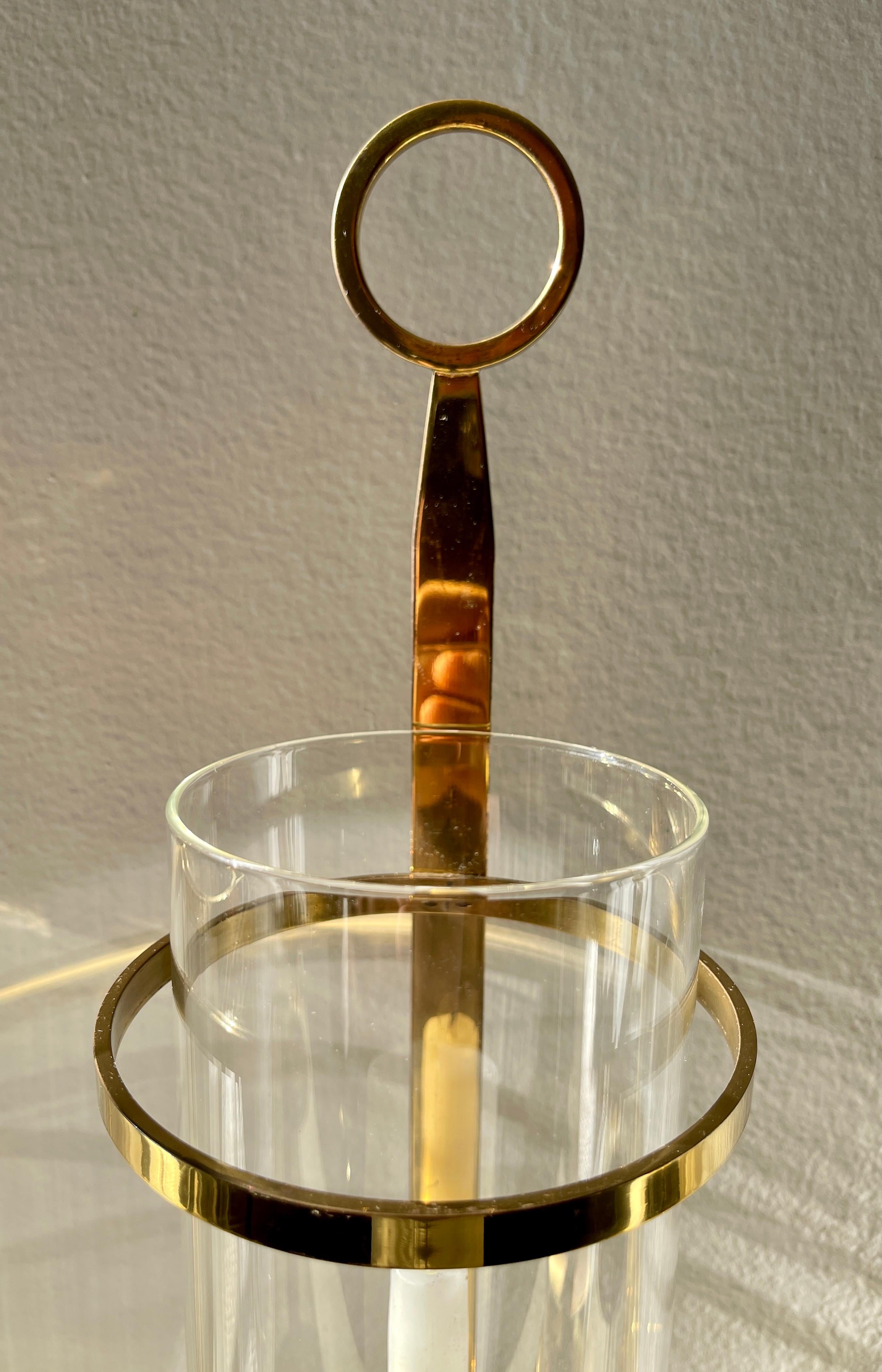 Mid-20th Century Tommi Parzinger           (1901 - 1981) Pair of Brass and Glass Candle Holders 