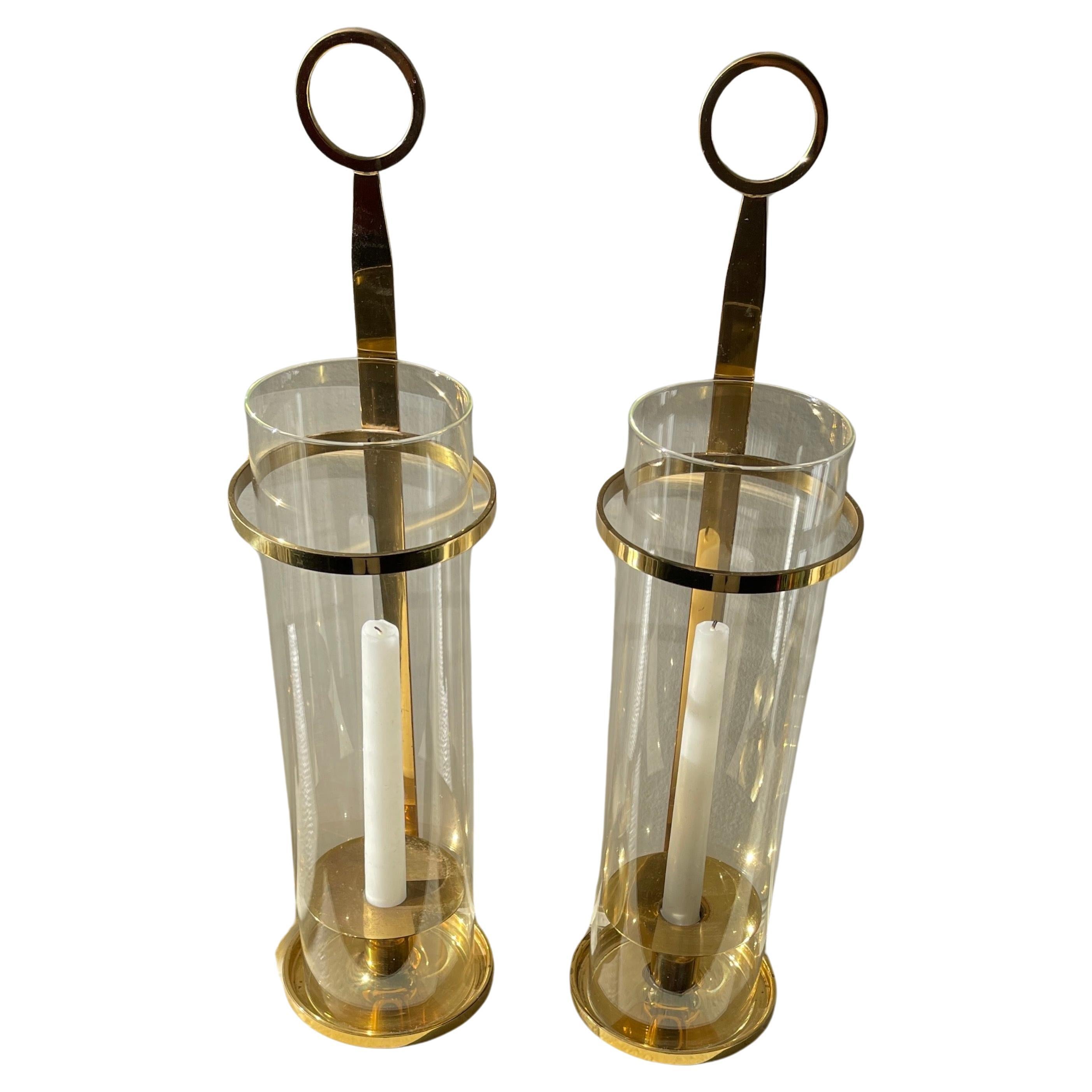 Tommi Parzinger (1901 - 1981)  Pair of Brass and Glass Candle holders. 
Parzinger's works were referred as 