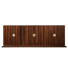 Tommi Parzinger 6-Door Credenza in Walnut with Iconic Brass Hardware 1960s