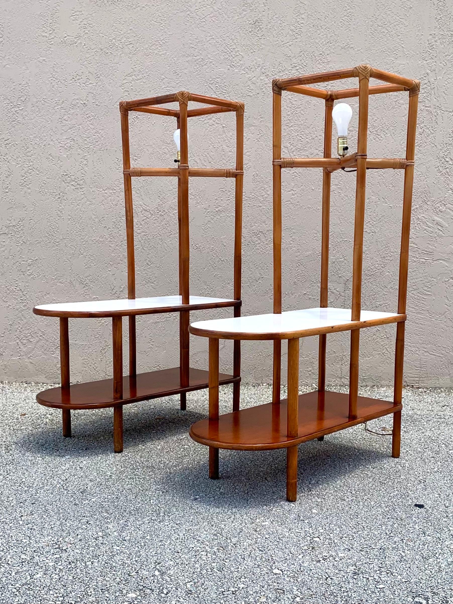 Pair of Tommi Parzinger attributed lighted end tables. Pulled from a Palm Beach estate with multiple pieces of Tommi Parzinger for Willow Reed furniture made with the same materials and finish. These end tables however are unmarked. There are