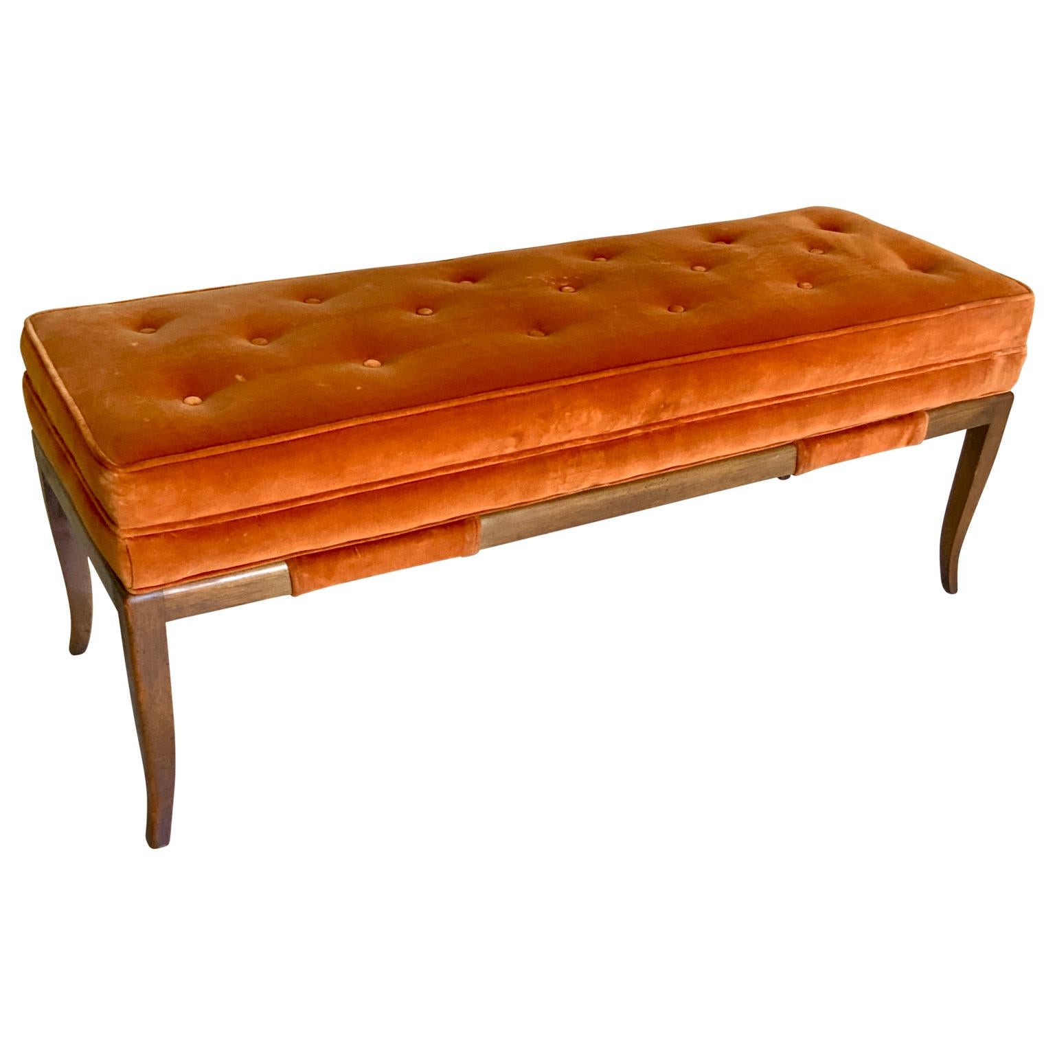 Offering a Tommi Parzinger for Parzinger originals collection tufted burnt orange velvet upholstered bench. This graceful fruitwood bench is untouched, original from the 1960's. Great in a bedroom, hallway, or entryway.