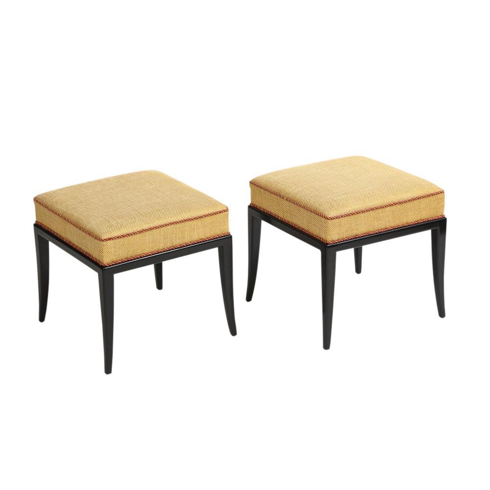 Tommi Parzinger Stools, Benches, Ebonized Wood, Upholstery. An uncommon pair of simple and elegant square stools with splayed legs, upholstered in a period burlap jute with red piping. 