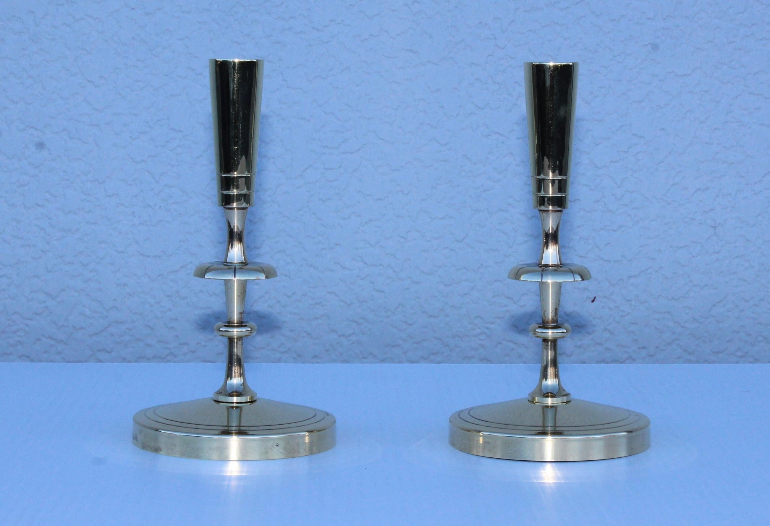 1950s brass candleholders designed by Tommi Parzinger for Dorlyn Silversmiths.