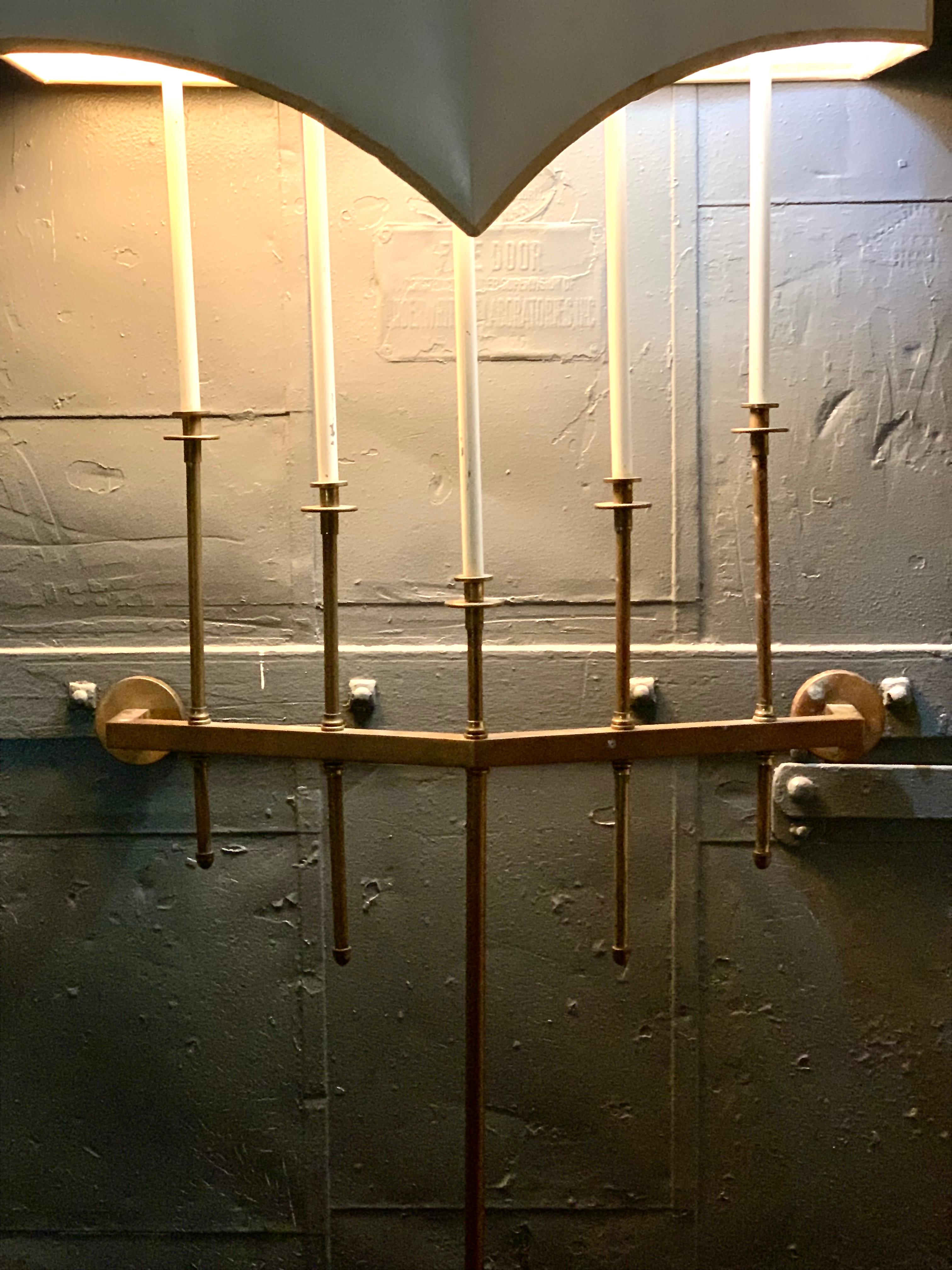 Tommi Parzinger 1950s Hollywood Regency custom signature brass candle-form wall light fixture / wall sconce. 5 candle lights