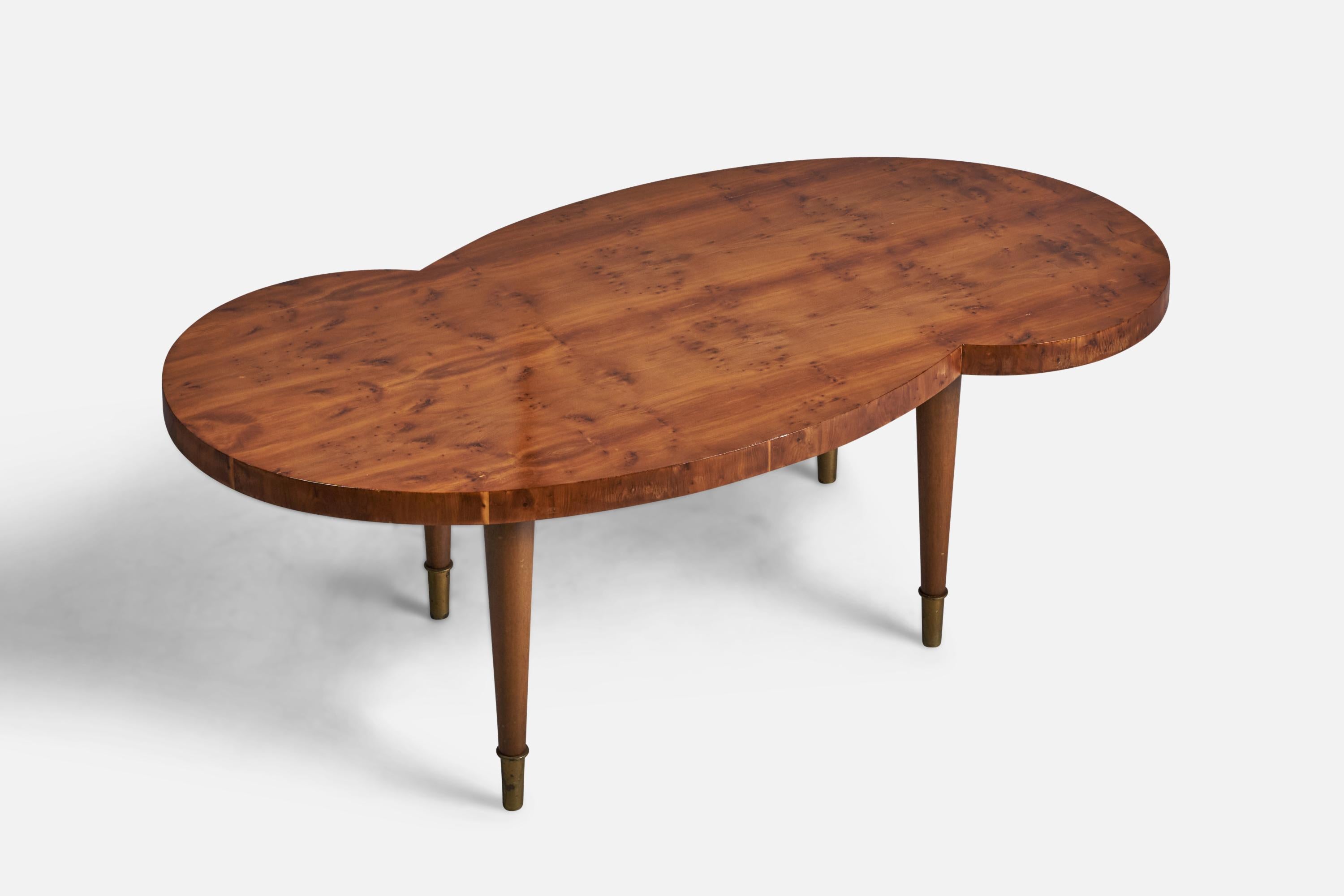A freeform mahogany, mahogany burl veneer and brass coffee or cocktail table, designed by Tommi Parzinger and produced by Charak Modern, USA, 1950s.