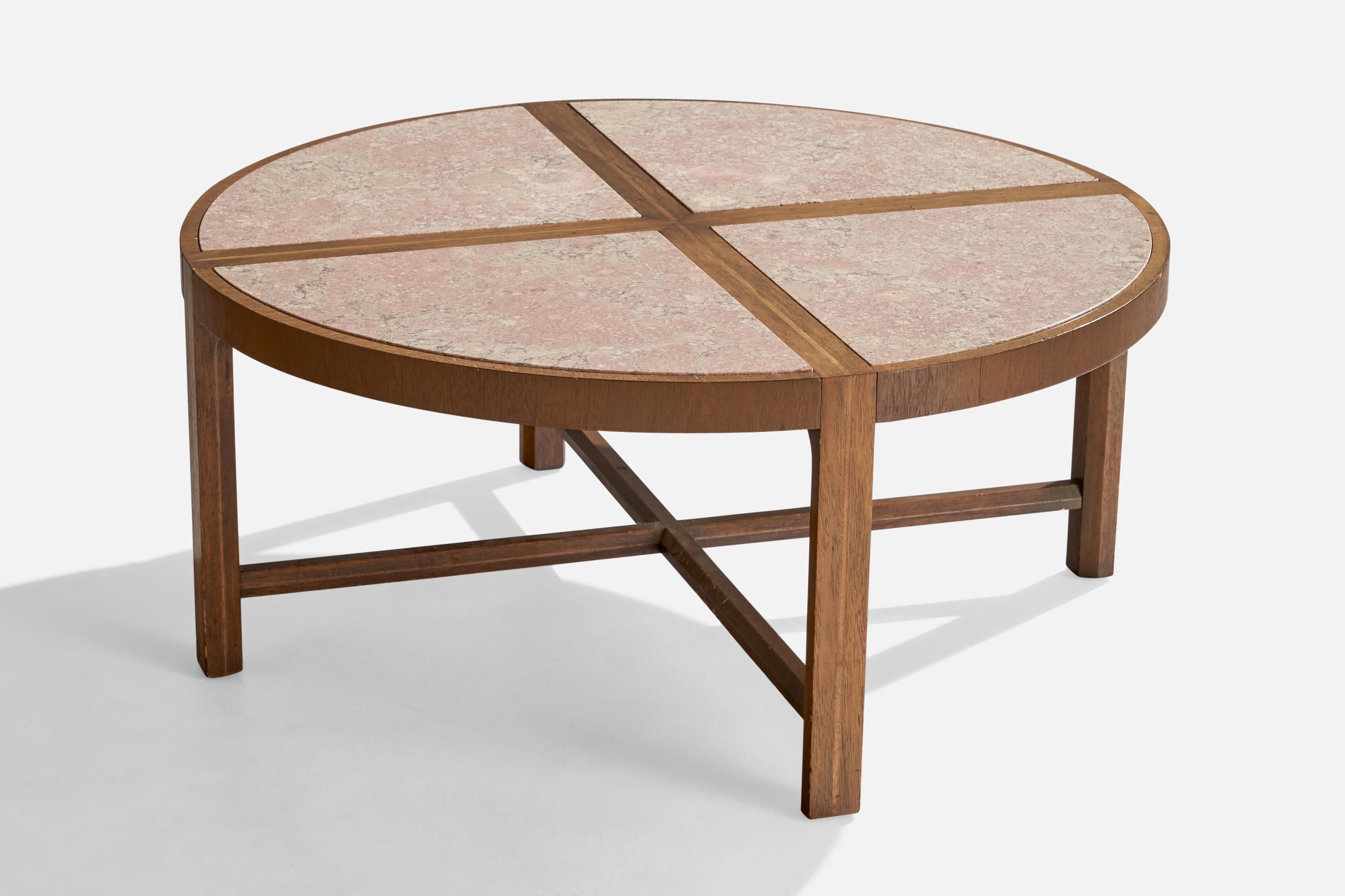 A walnut and travertine coffee table designed by Tommi Parzinger and produced by Charak Modern, USA, c. 1950s.


