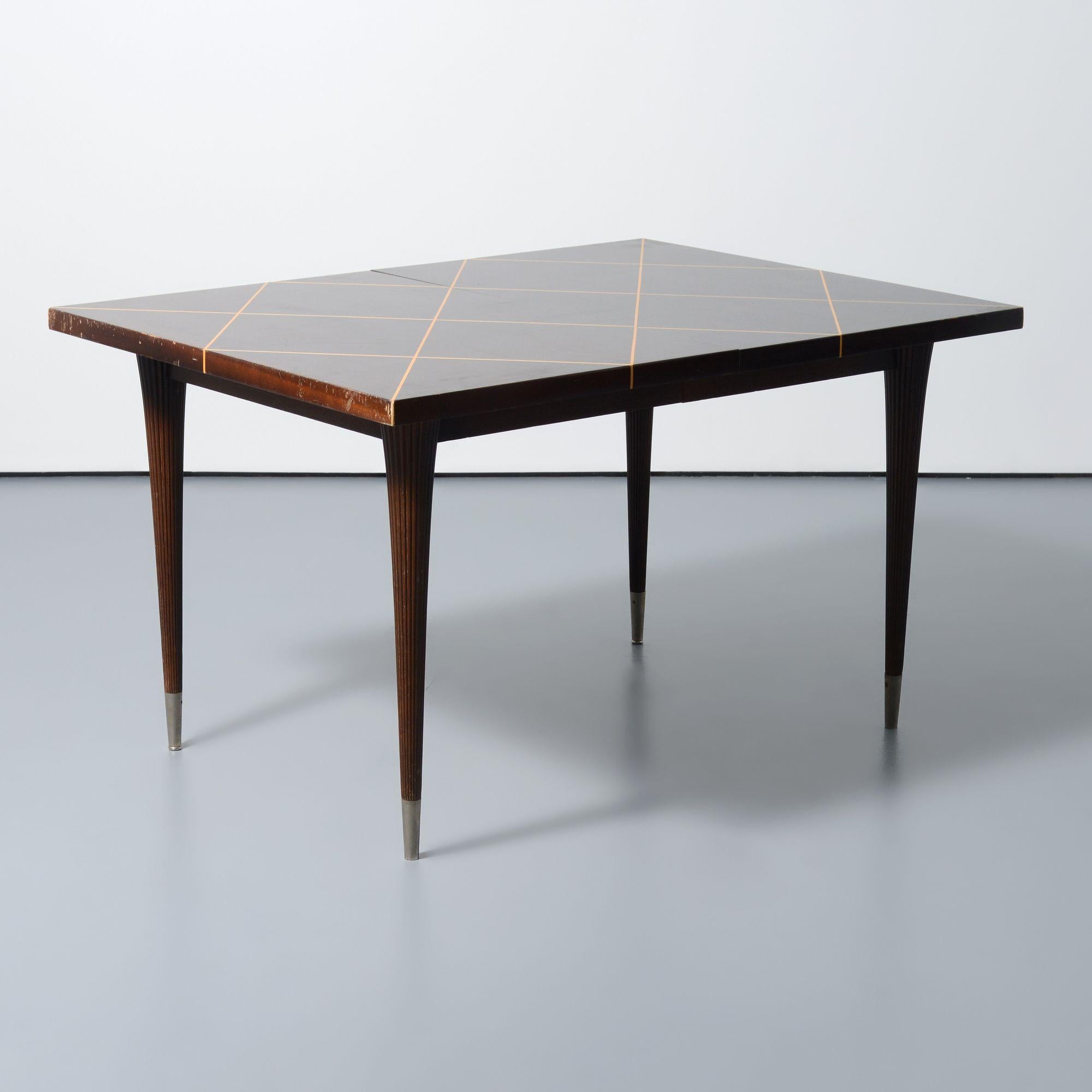 Artist/Designer; Manufacturer: Tommi Parzinger (American, 1903-1981); Charak Modern (USA)
Marking(s); notes: marking(s)
Materials: mahogany, satinwood inlay, metal
Dimensions (H, W, D): without leaf: 29