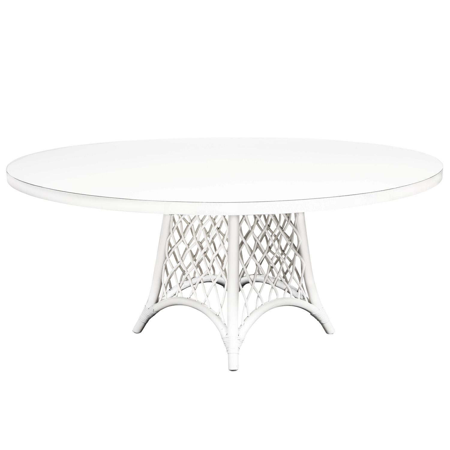 Elegant white lacquered dining table base with splaying legs,  white laminate top and criss-cross design base by Henry Olko for Willow and Reed, American 1950’s.  Willow and Reed designed furniture ideal for enclosed porches or outdoor areas not
