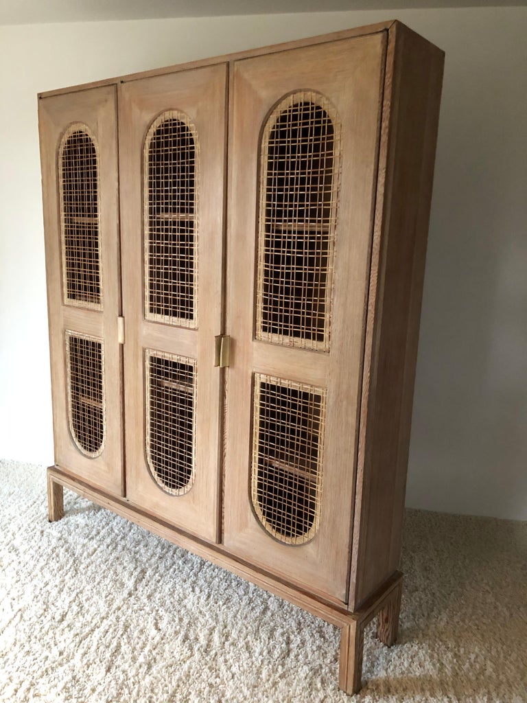 Tommi Parzinger Early Important Tall Bookcase Limed Sawed Oak Cane Door For Sale at 1stDibs