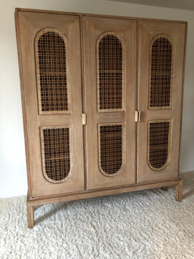 Tommi Parzinger Early Important Tall Bookcase Limed Sawed Oak Cane Door For Sale at 1stDibs