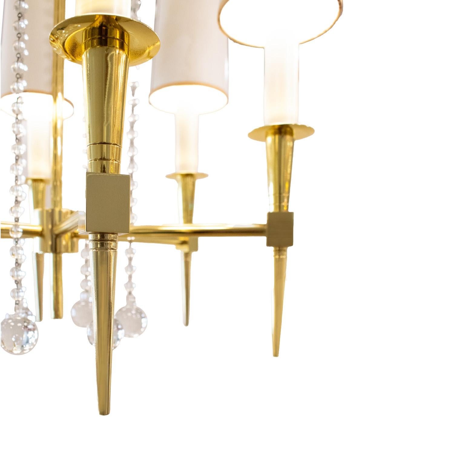Tommi Parzinger Elegant 6 Arm Chandelier in Brass with Crystal Beads 1950s In Excellent Condition For Sale In New York, NY