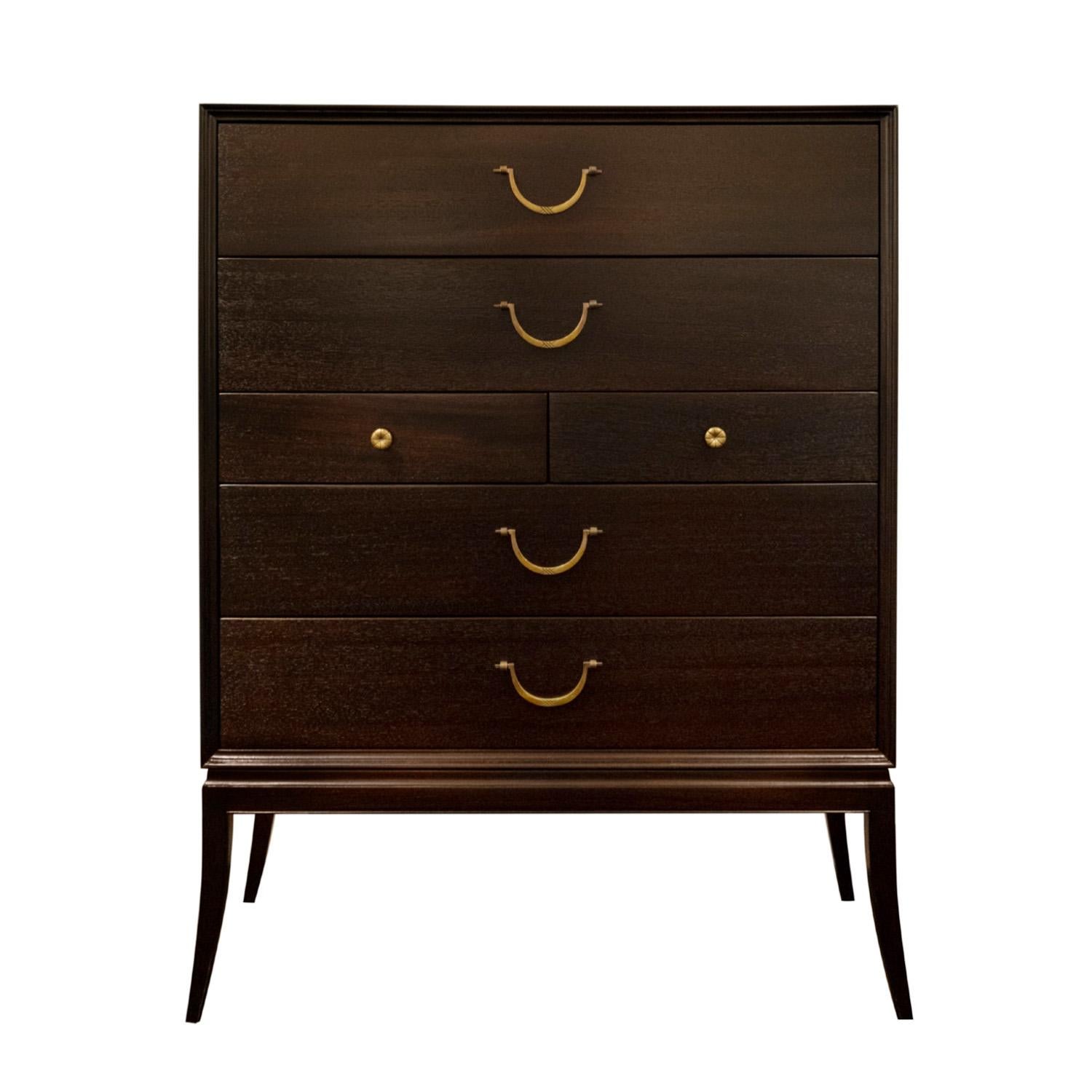 Superbly crafted tall chest of drawers model M603 in mahogany with tapering legs and etched brass pulls by Tommi Parzinger for Charak Modern, American 1950's (signed 