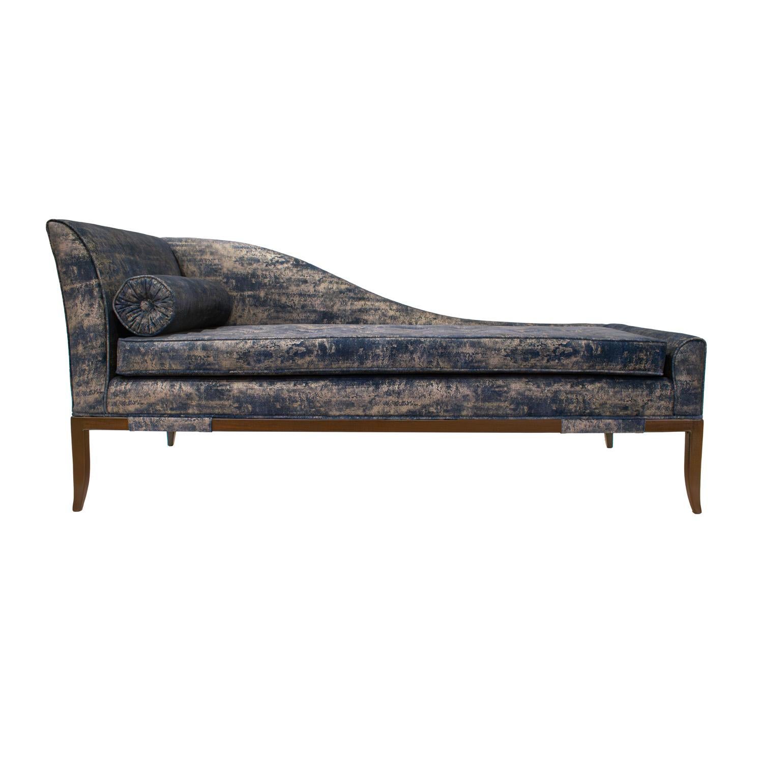 Elegant sloped back chaise model 201 with bolster and wrapped mahogany base by Tommi Parzinger for Parzinger Originals, American 1950’s.  This iconic Parzinger chaise is super chic.  Base refinished and newly reupholstered in a stunning blue and