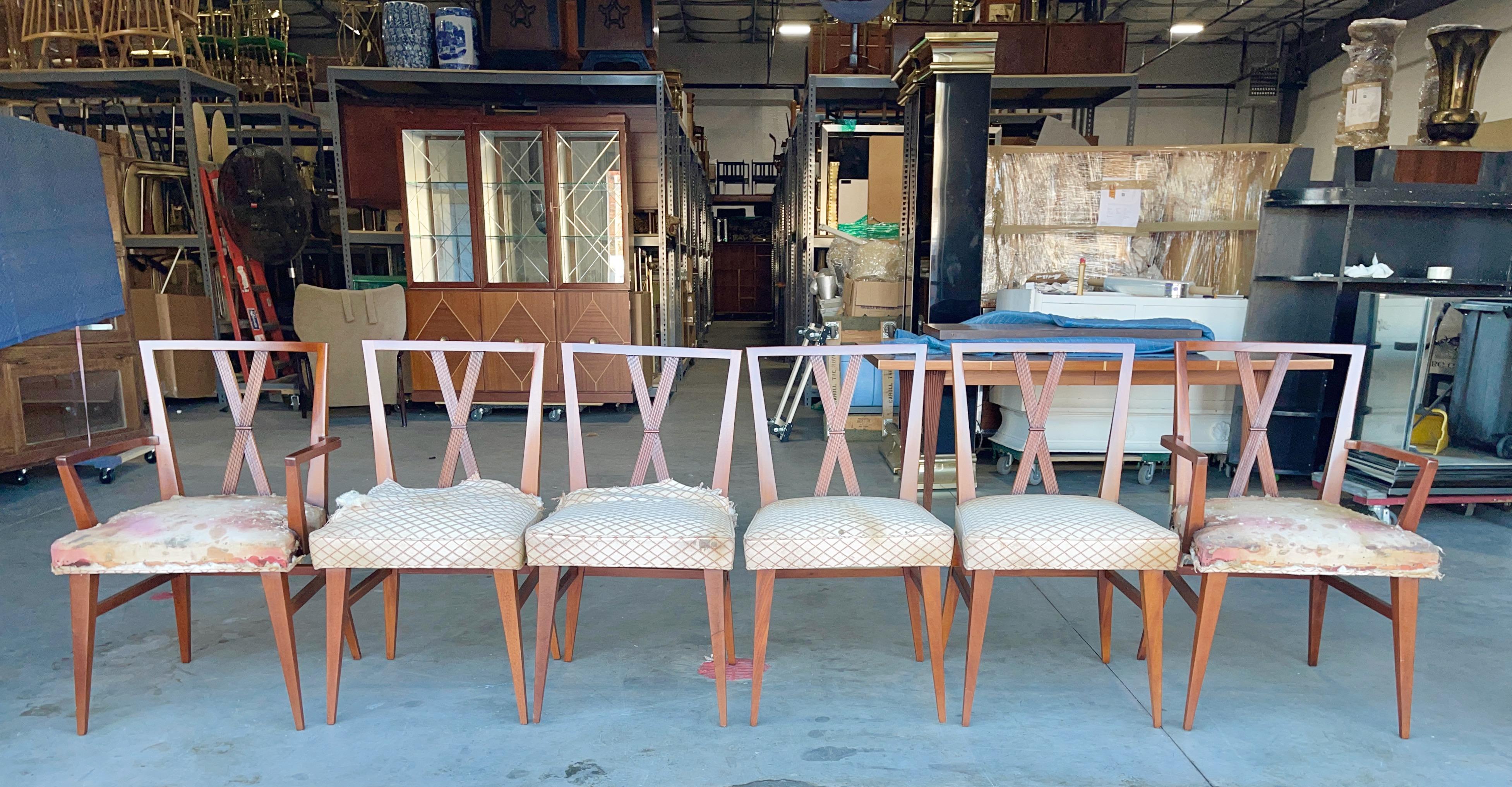 Set of six original Tommi Parzinger X back mahogany dining chairs for Charak Modern.
Four side chairs and two arm chairs. Arm height 26 inches.
All chairs have been beautifully refinished by our expert restorer and are ready for the seats to be