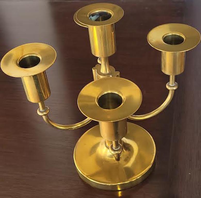 Five armed brass candelabra designed by Tommi Parziner. Signed, D.S (Dorlyn Silversmiths) Ready Use.