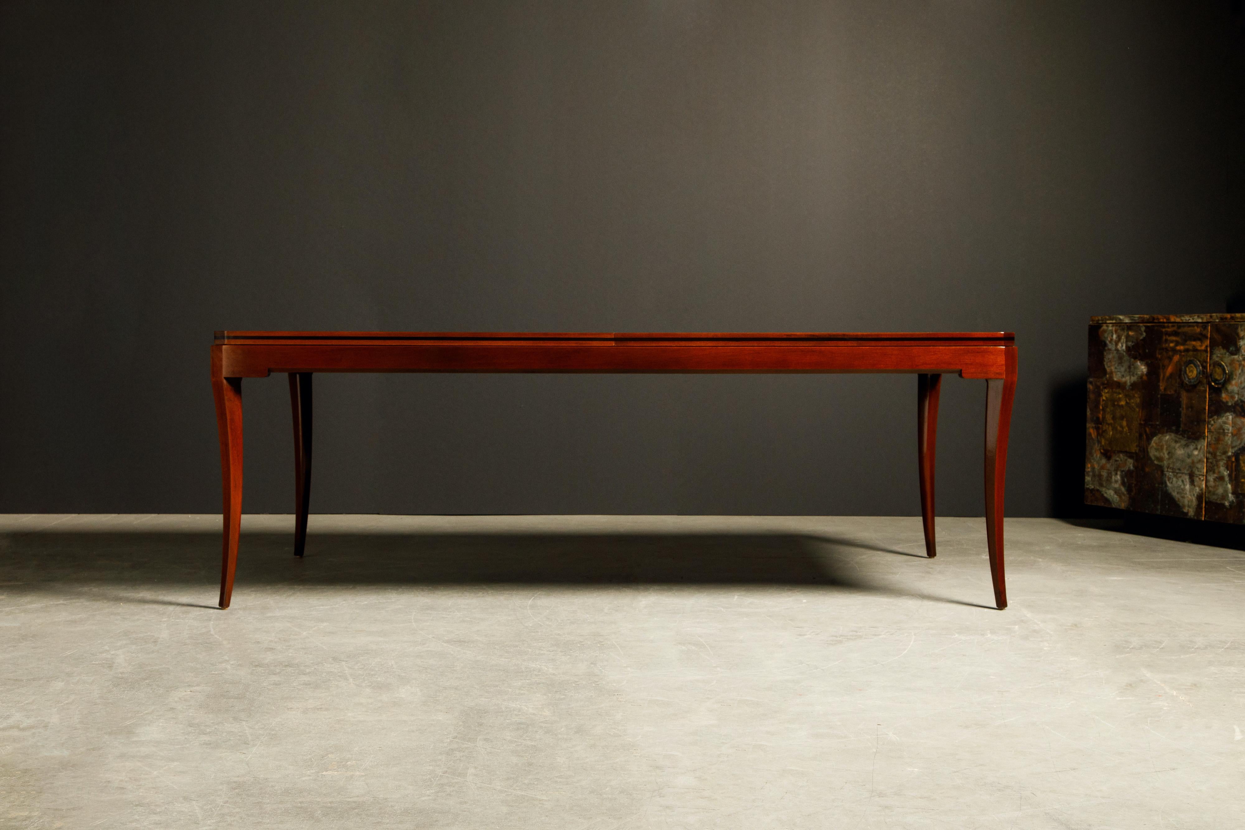 An incredible signed Parzinger Originals mahogany and ebony inlay dining table designed by Tommi Parzinger and crafted in the early 1960s, signed underneath 