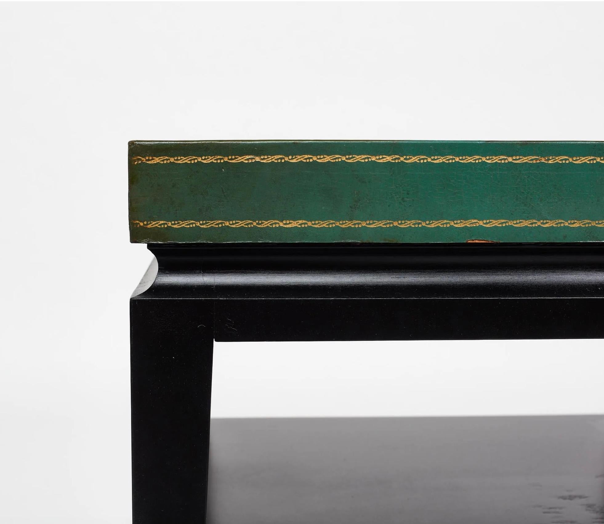 Tommi Parzinger green leather occasional table, model no. 3303, ca. 1955
Ebonized wood, embossed leather. Manufactured by Charak, USA.
Measures: 26